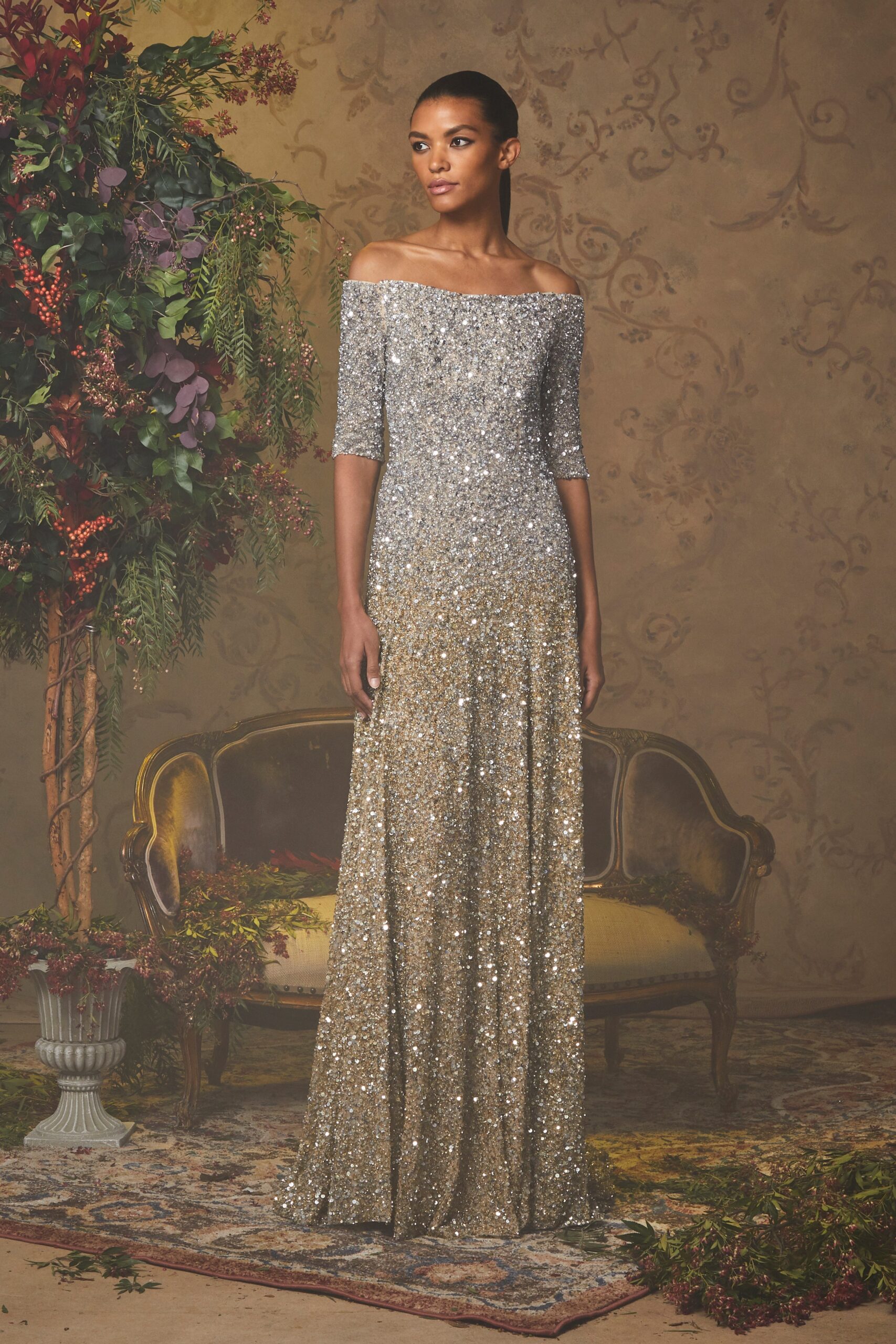 gold sequin off-shoulder gown