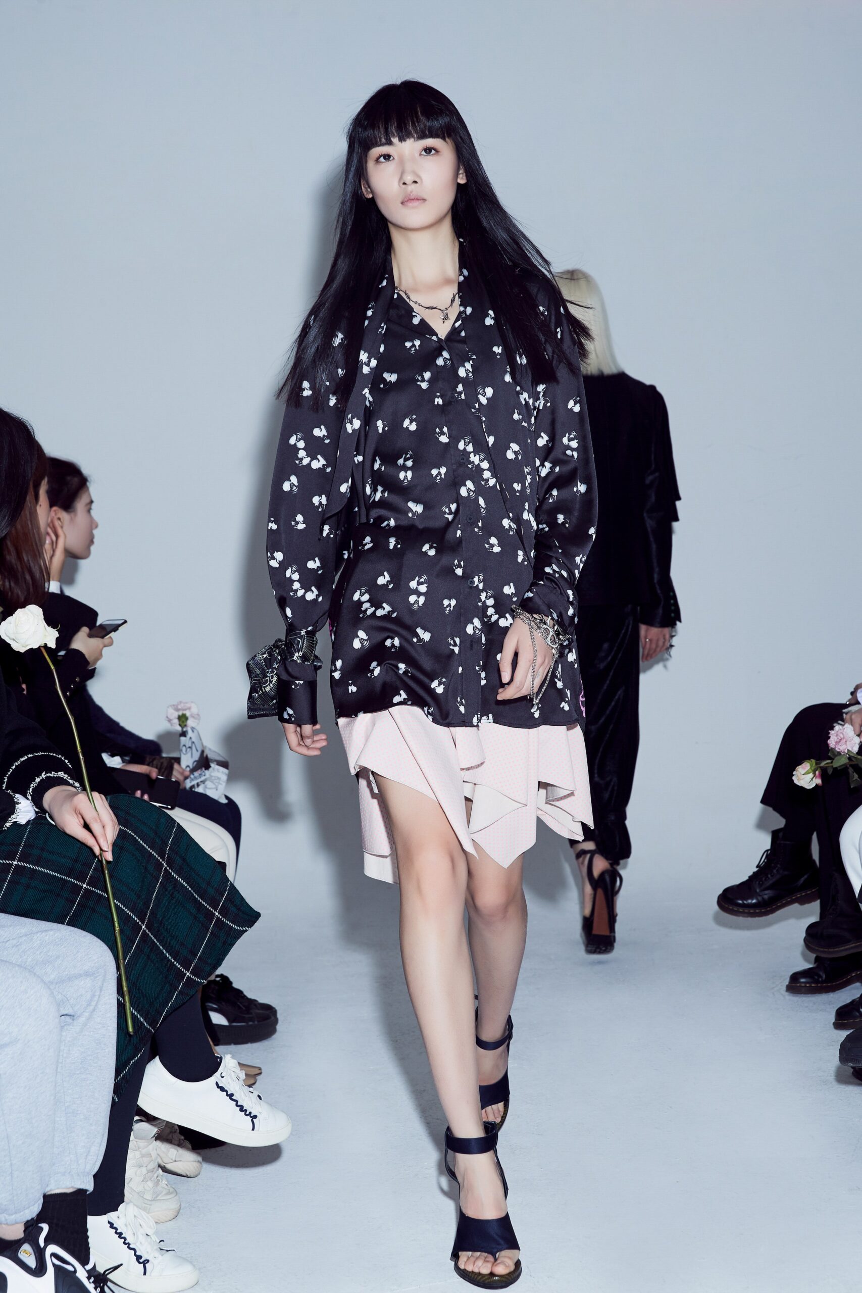 black silk shirt-dress with pleated skirt