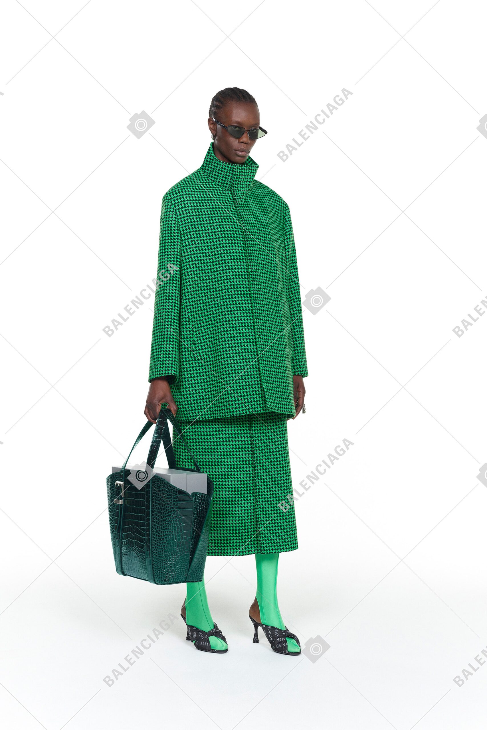green oversized coat and skirt