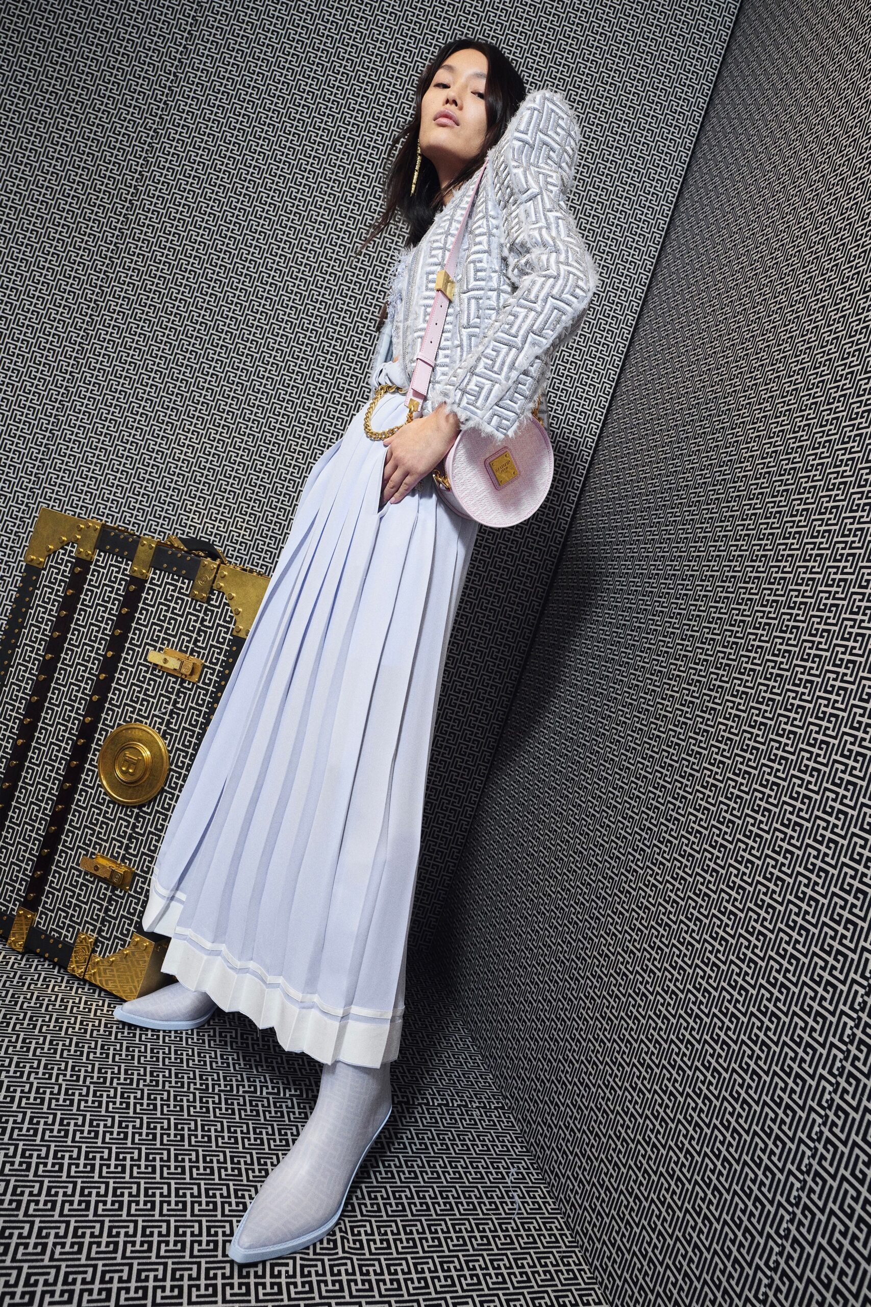 white gray embroidered blazer with pleated skirt