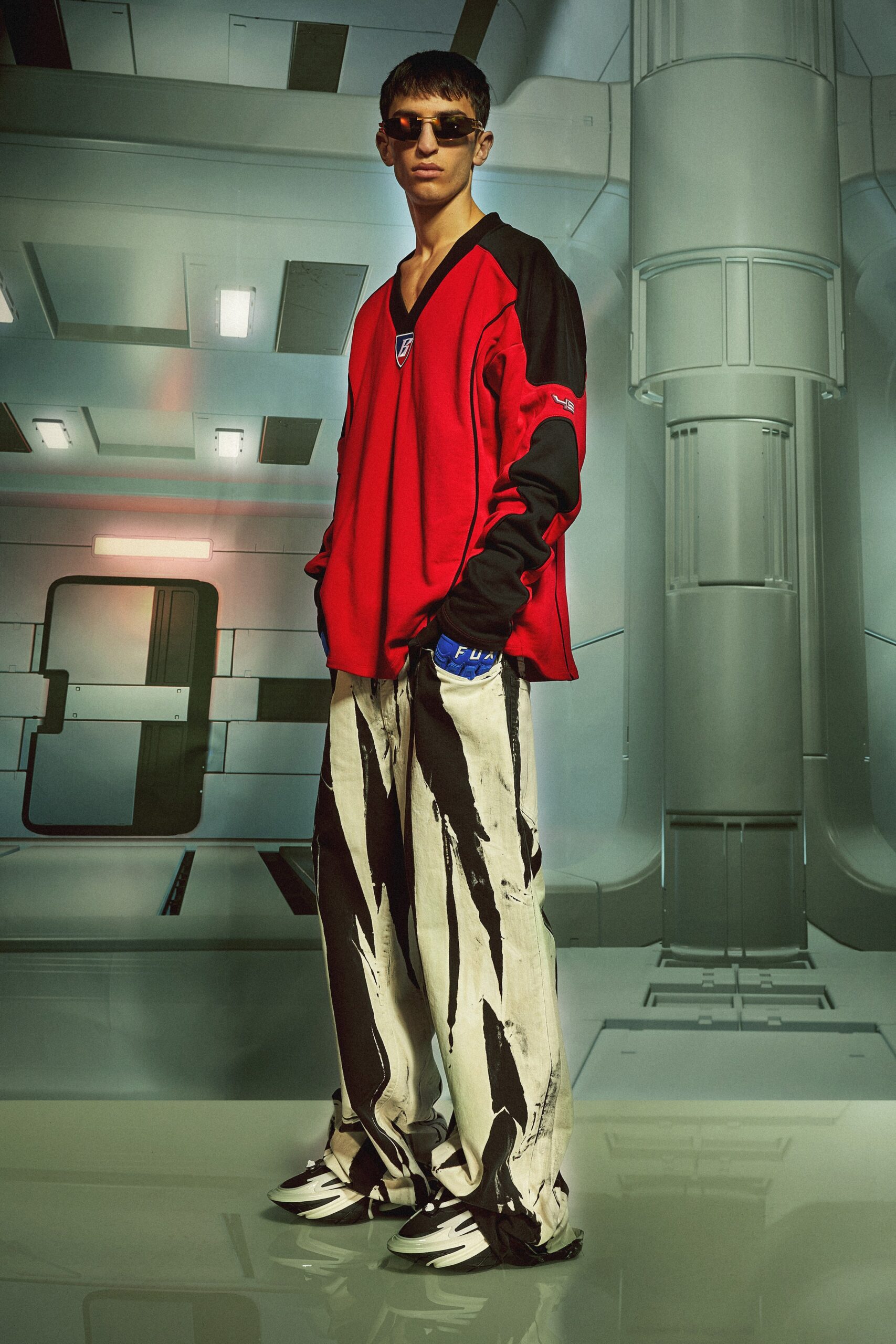 relaxed red color-blocked top with distressed pants