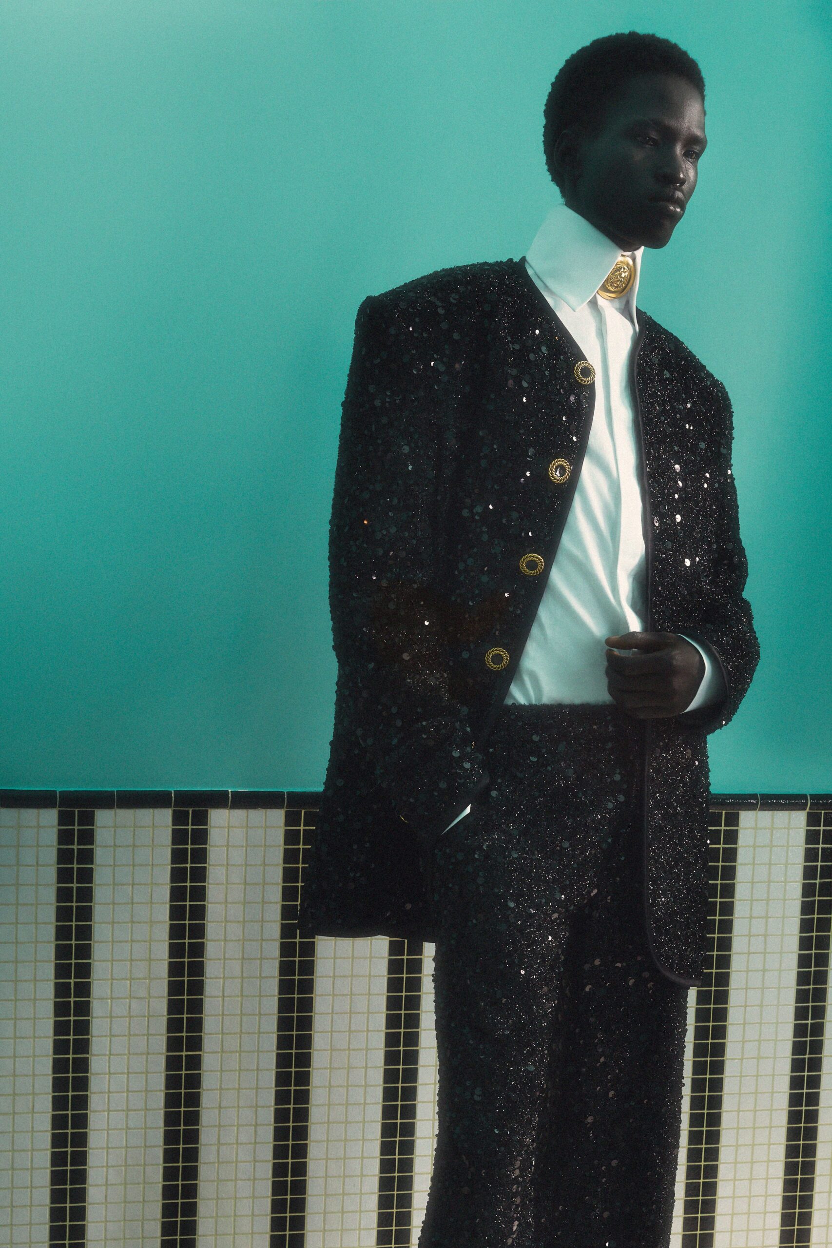 black sequin fitted suit with white shirt
