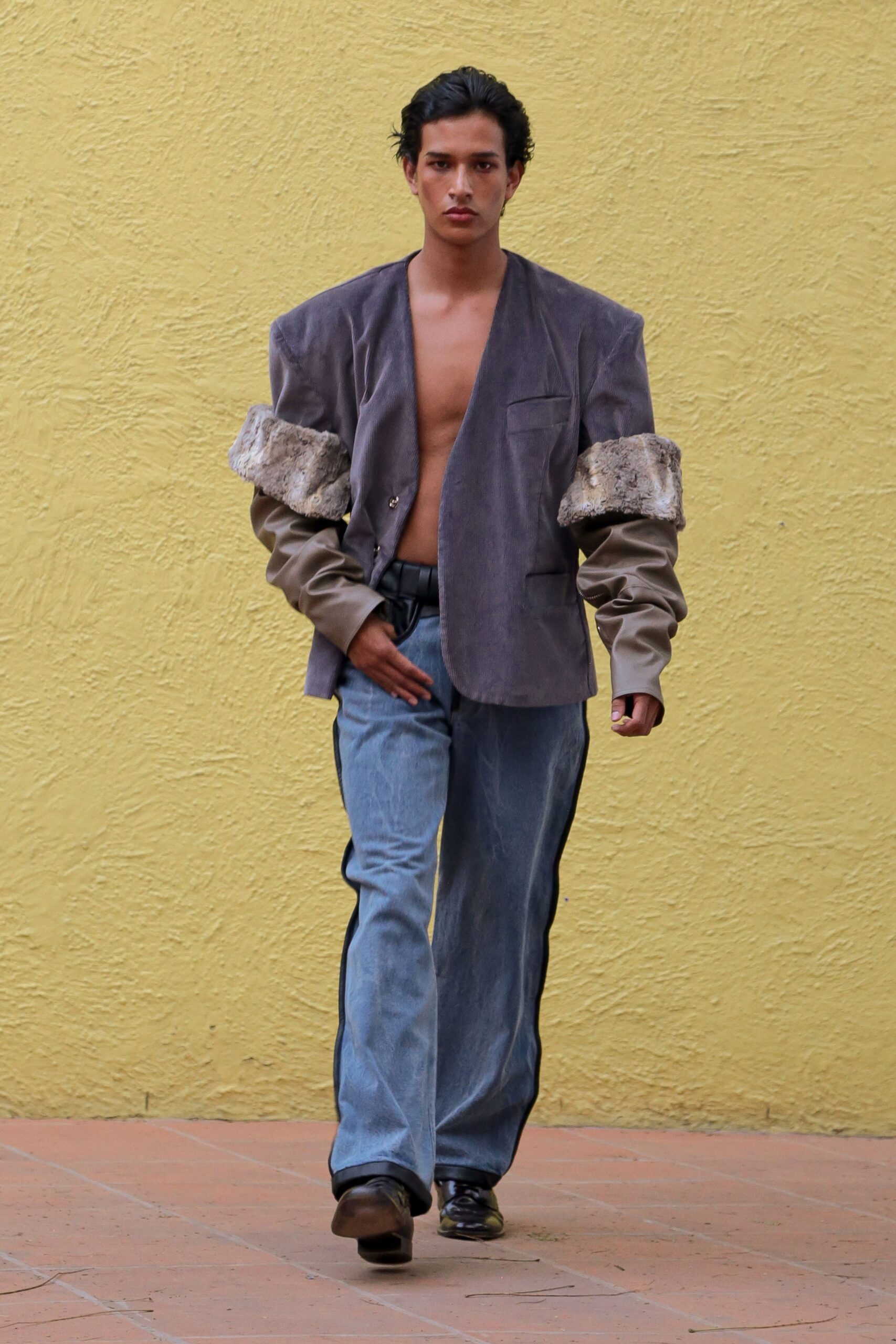 gray suede structured jacket with denim pants