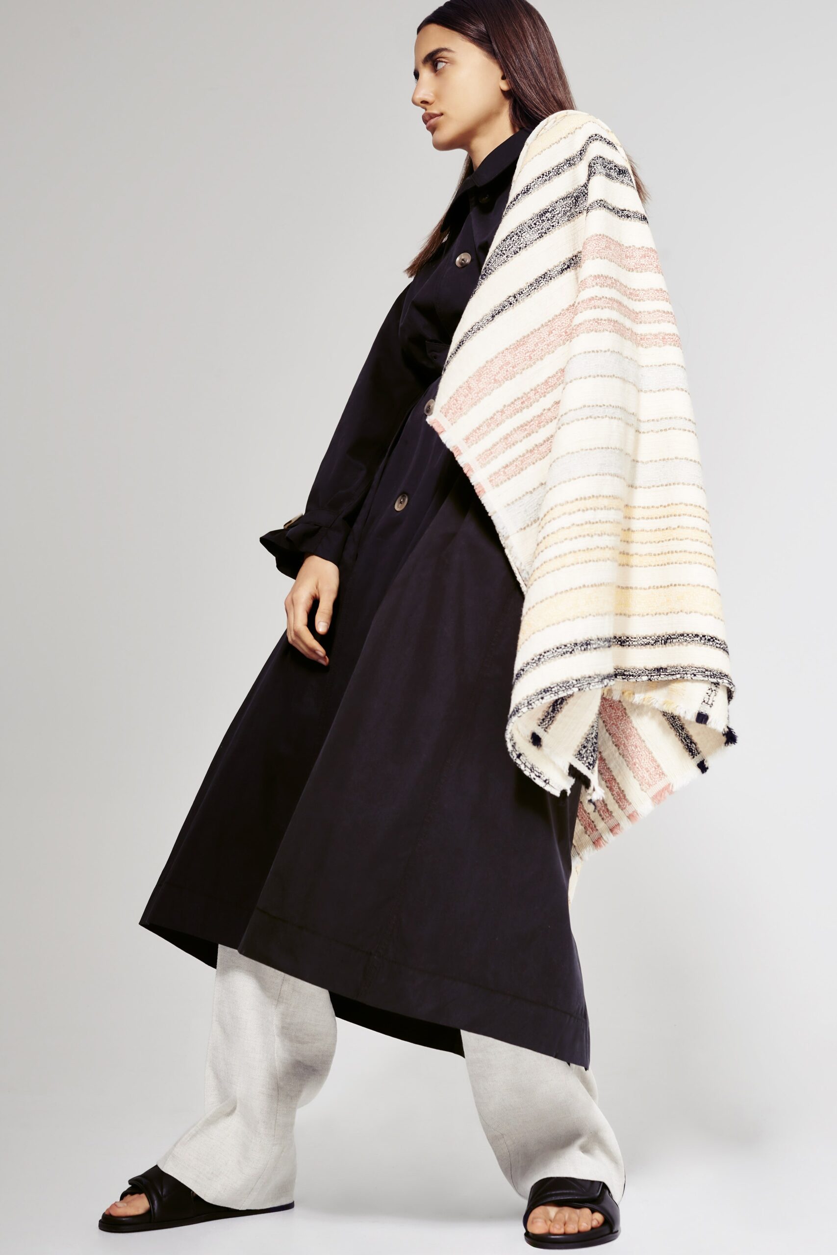 black trench coat with gray pants