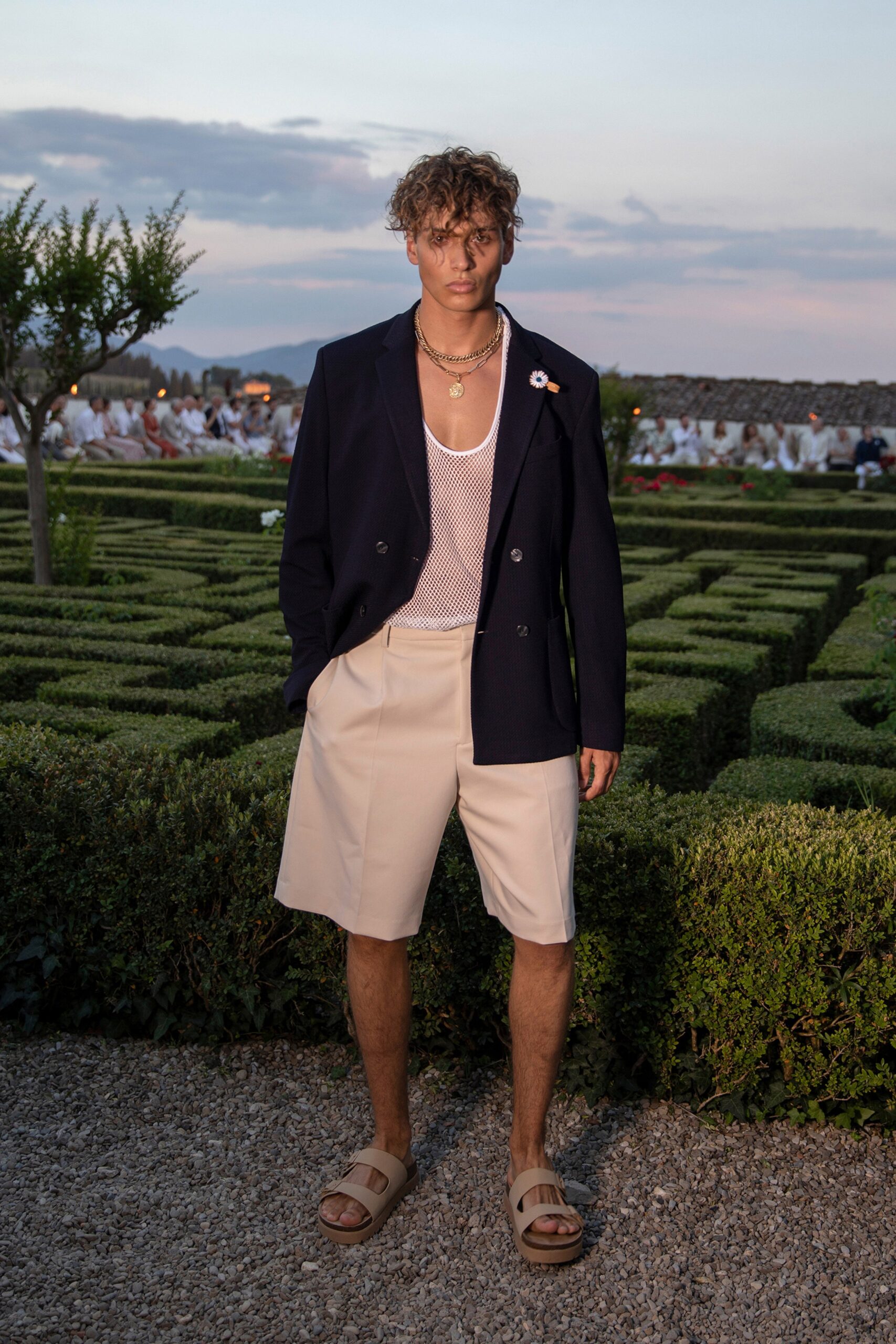 navy blazer with beige shorts