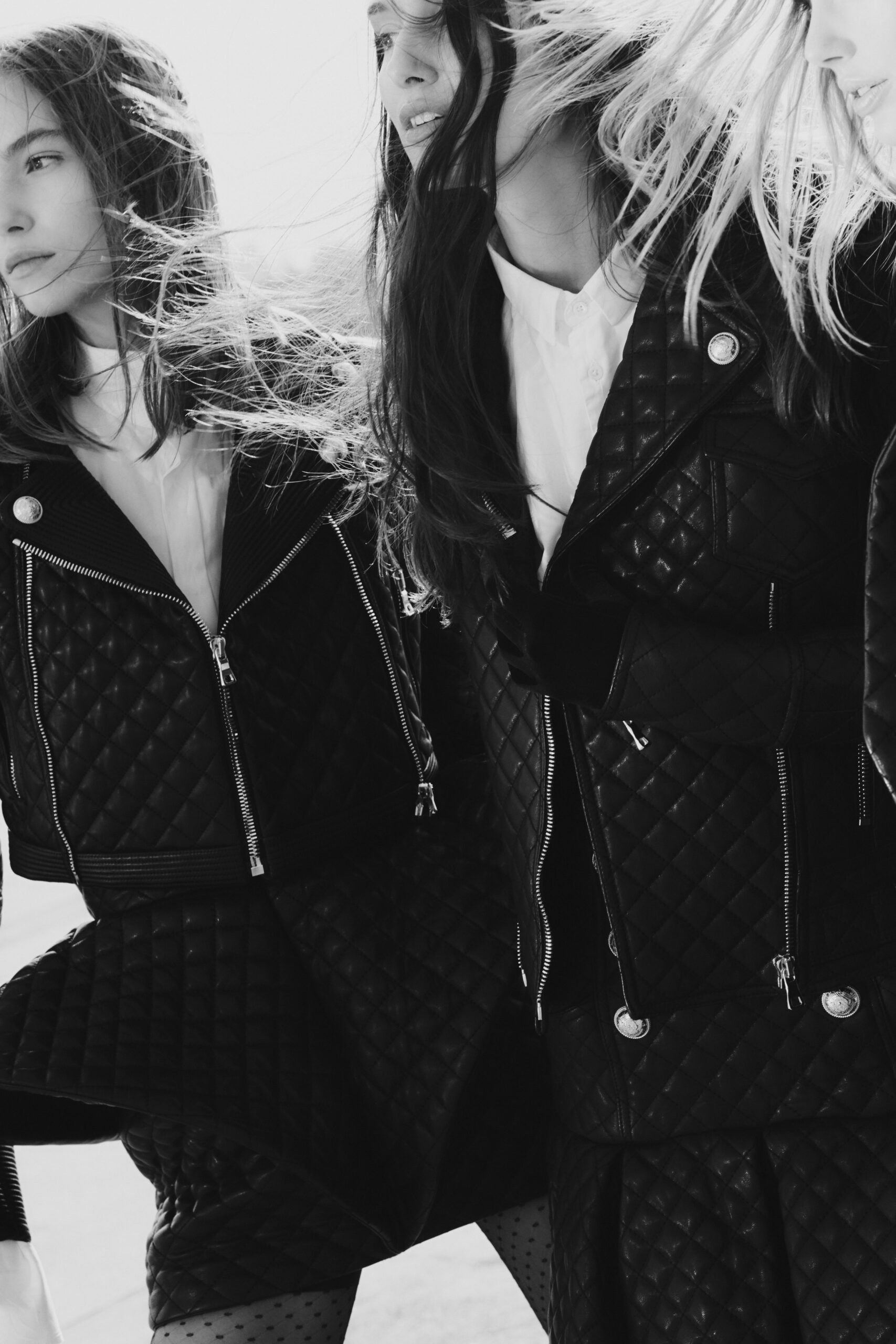 black leather quilted jacket and mini skirt