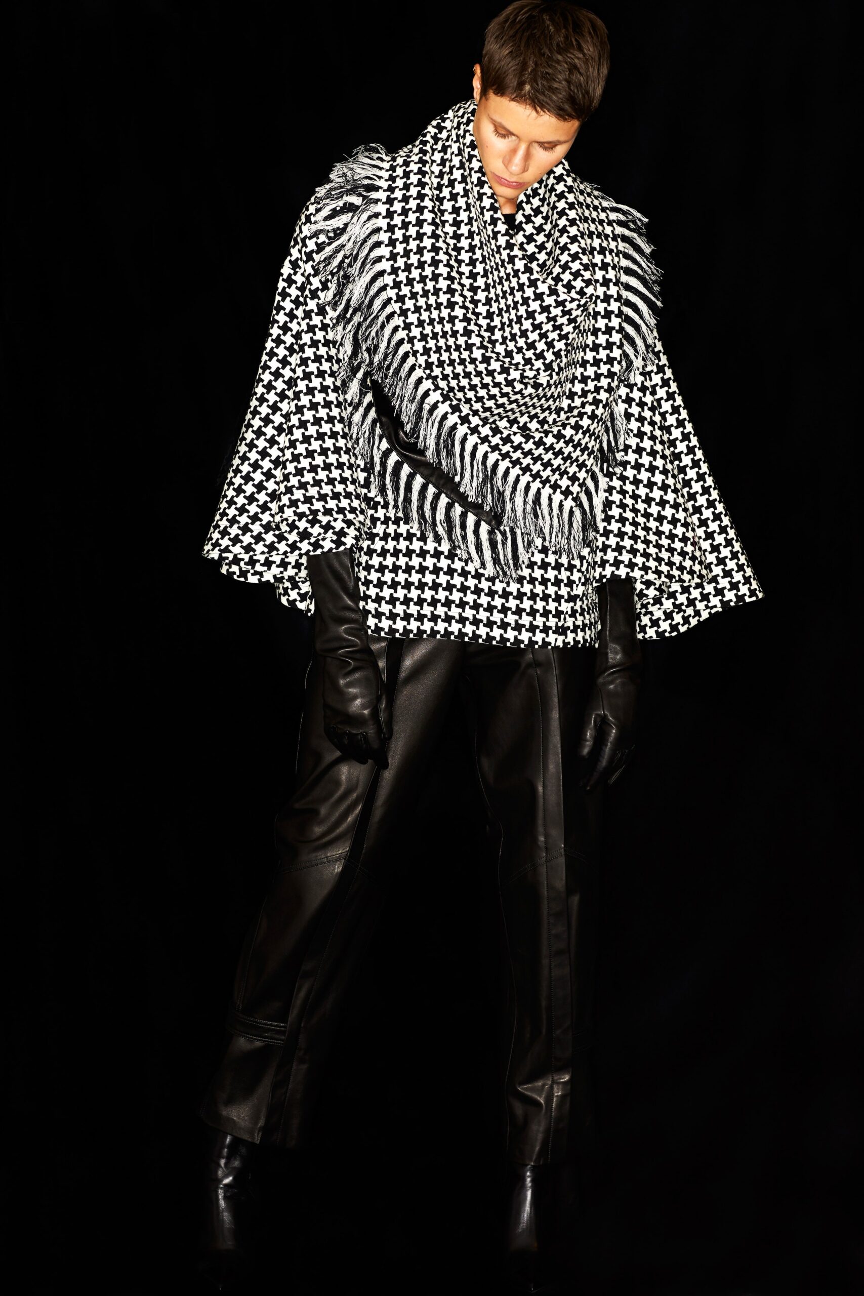 black wool sleeveless relaxed checked fringed poncho