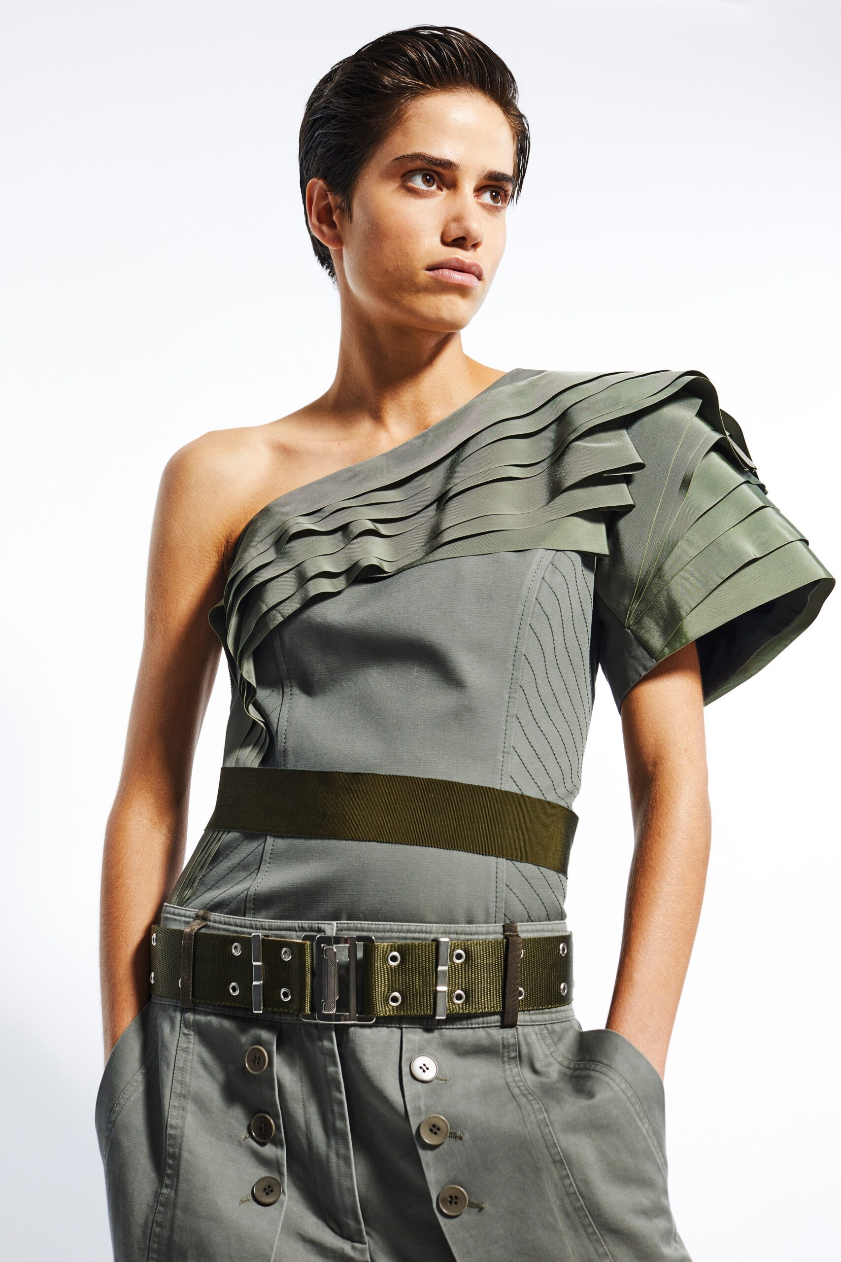 green fitted jumpsuit with pleats