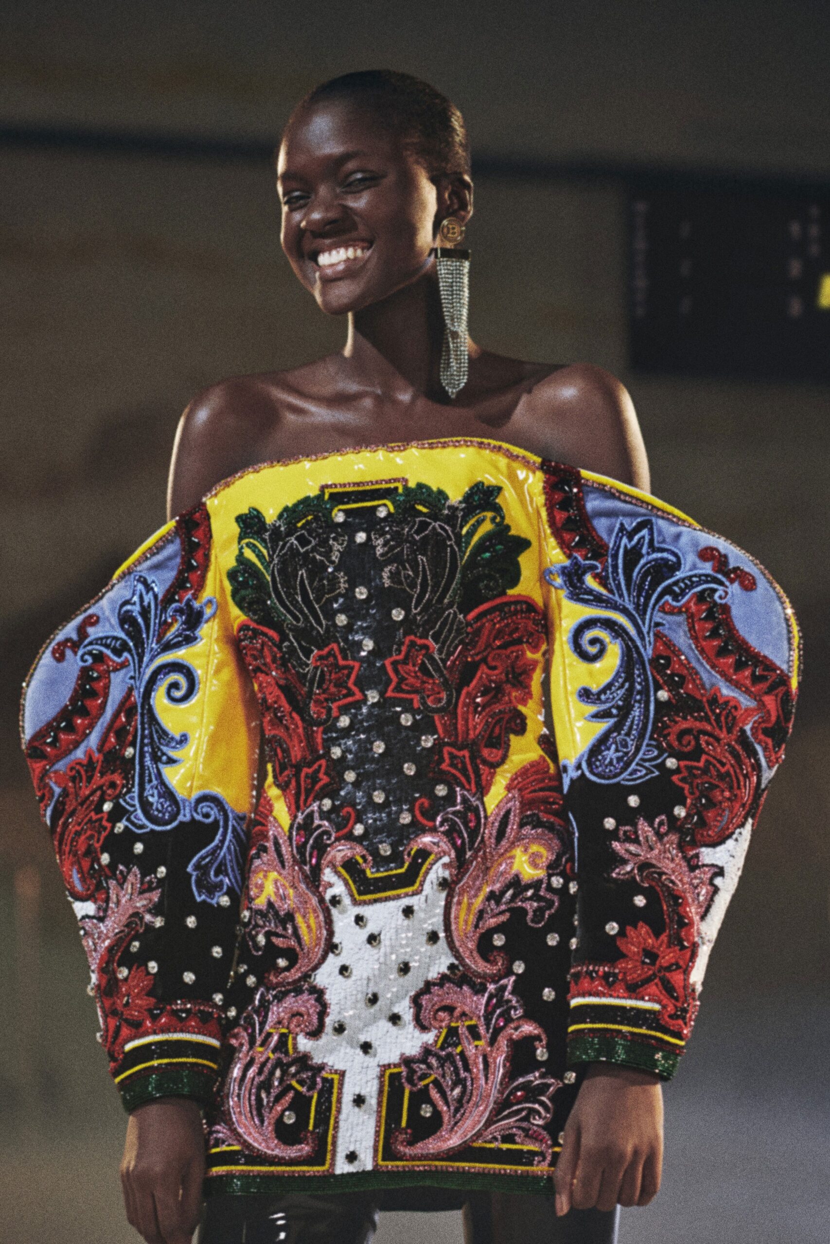 oversized embroidered top with fitted pants