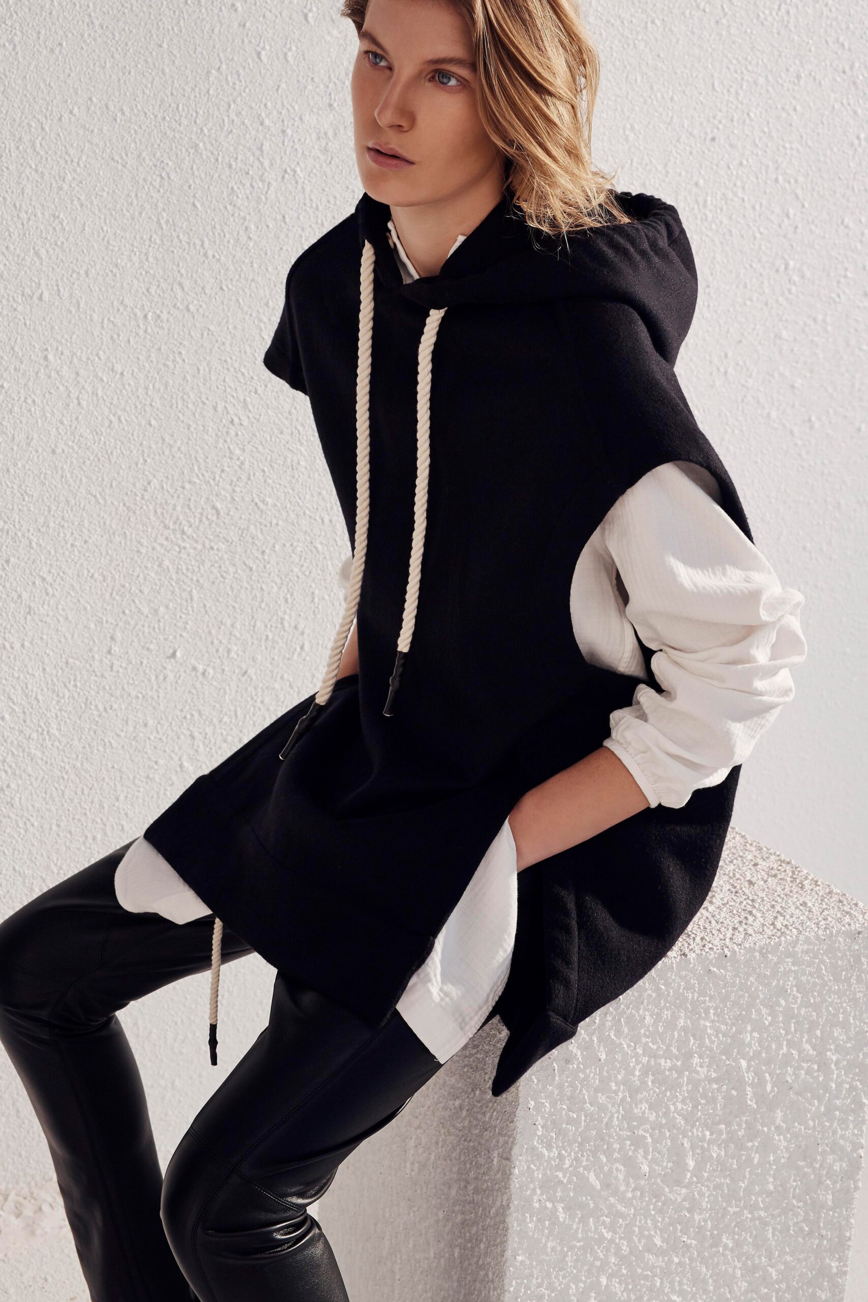 black hoodie white shirt leather pants