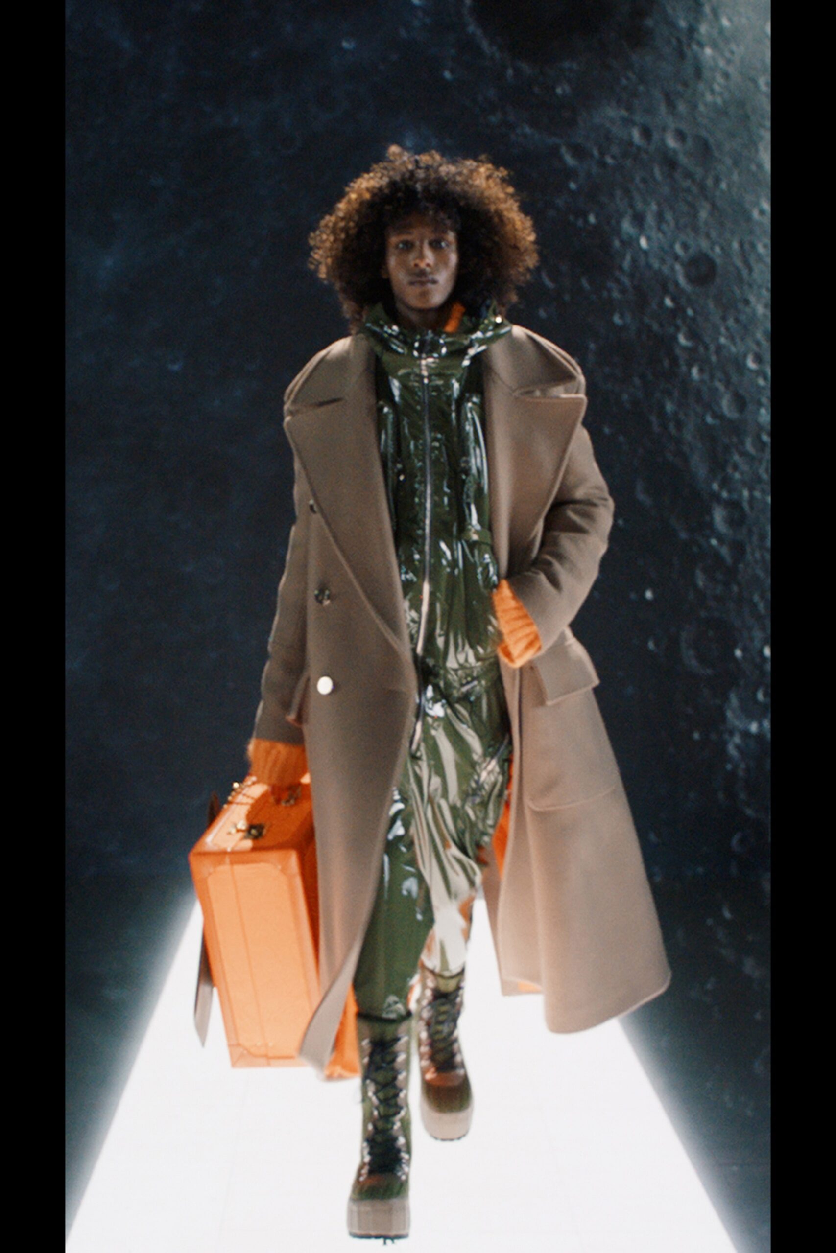 beige wool coat green vinyl jumpsuit