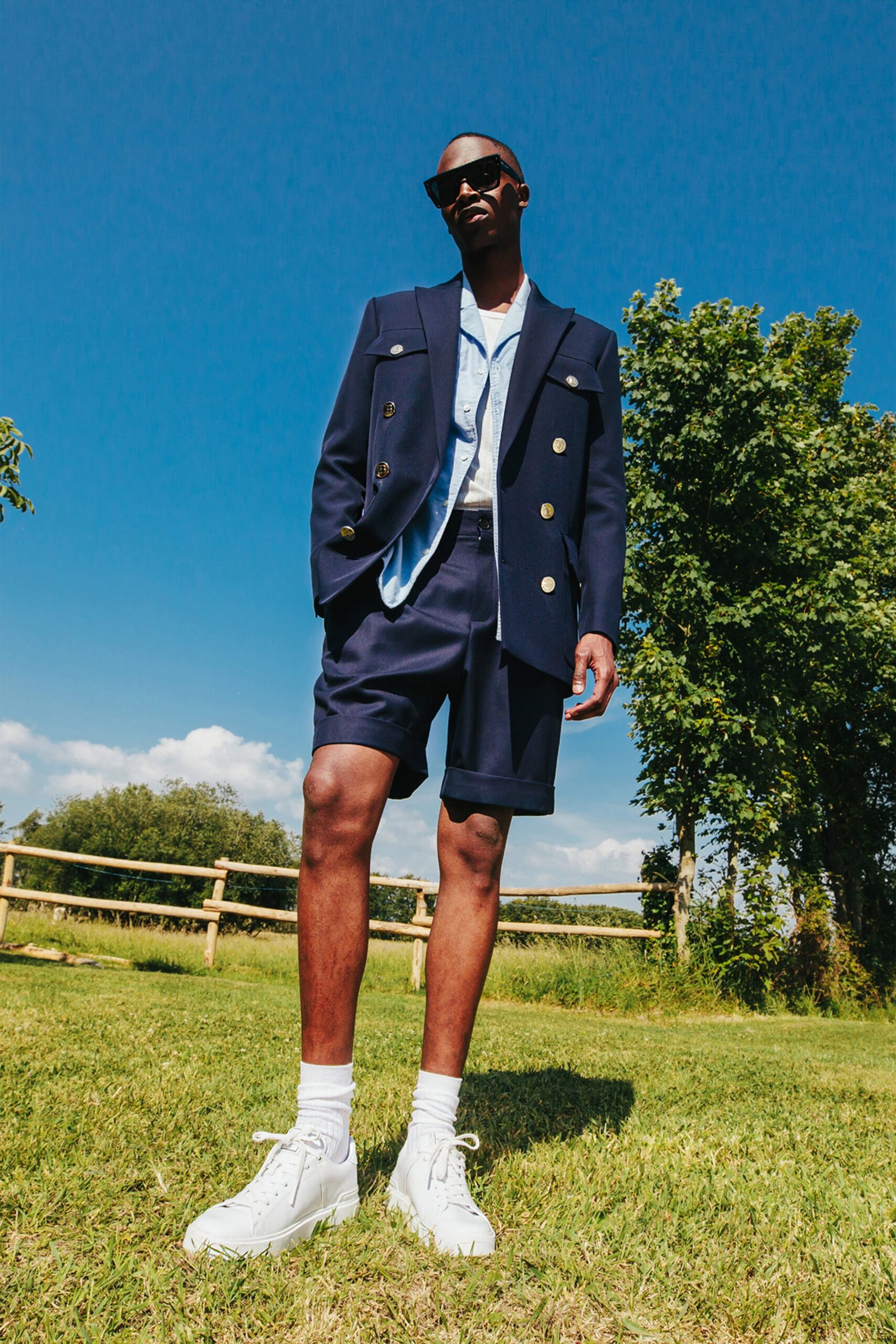 navy tailored blazer with shorts