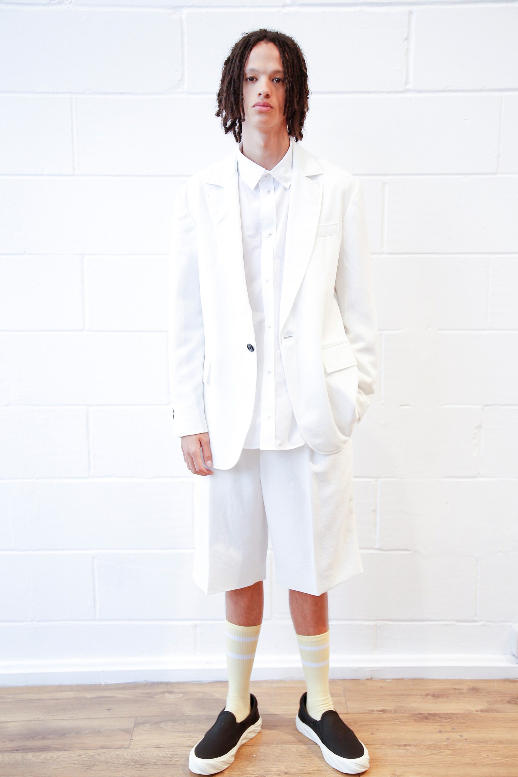 white tailored suit with shorts