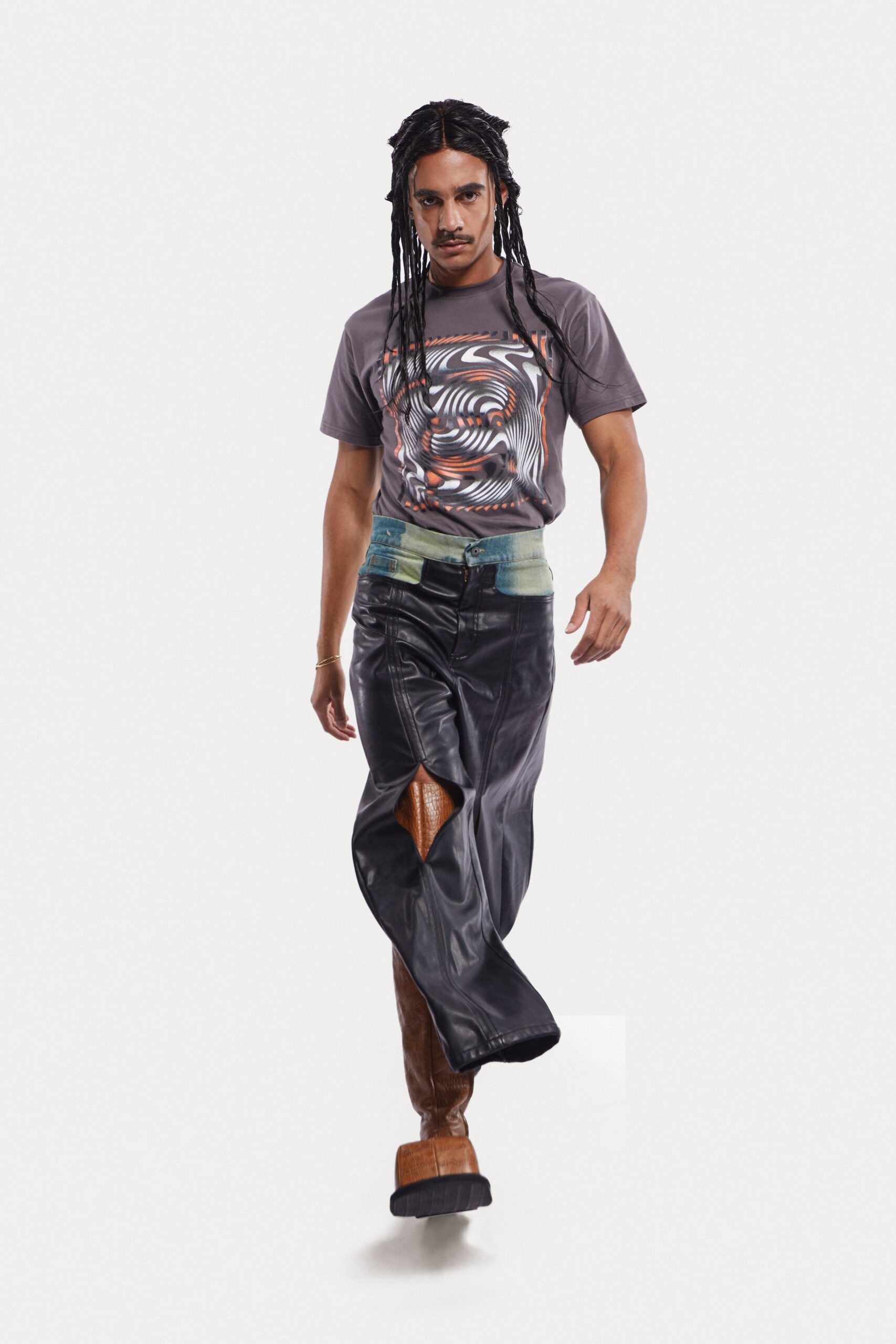 gray printed t-shirt and black leather pants