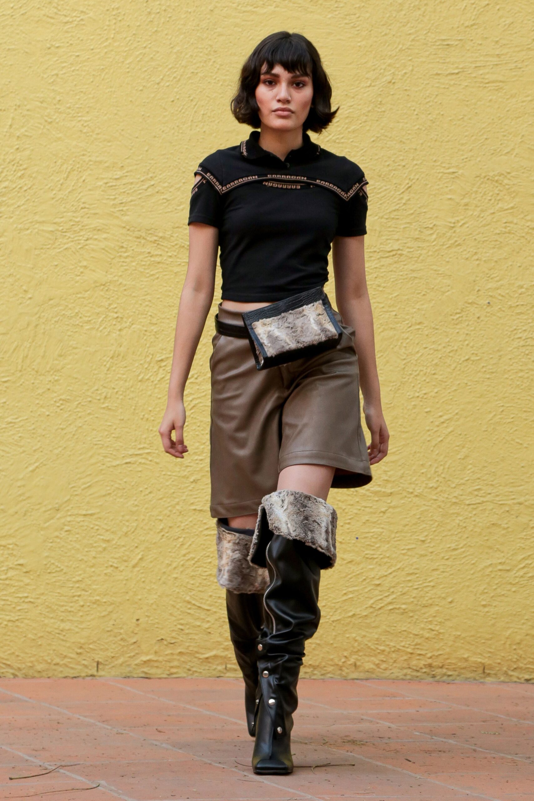 black fitted top with brown skirt