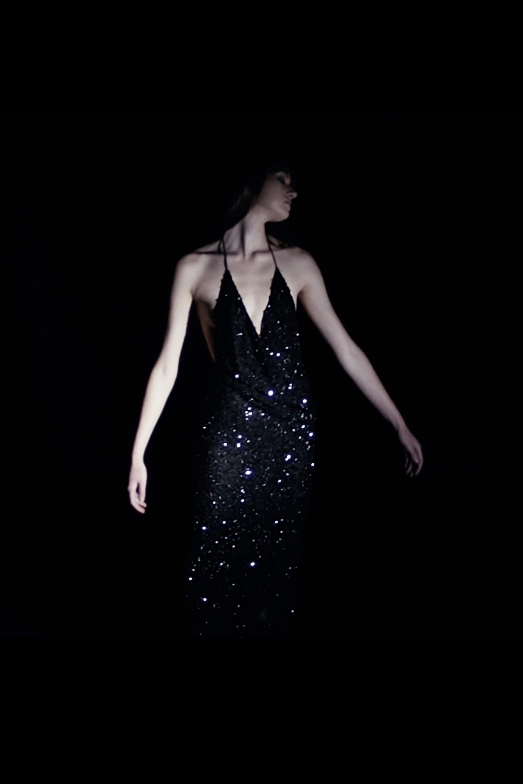 black sequined sleeveless gown