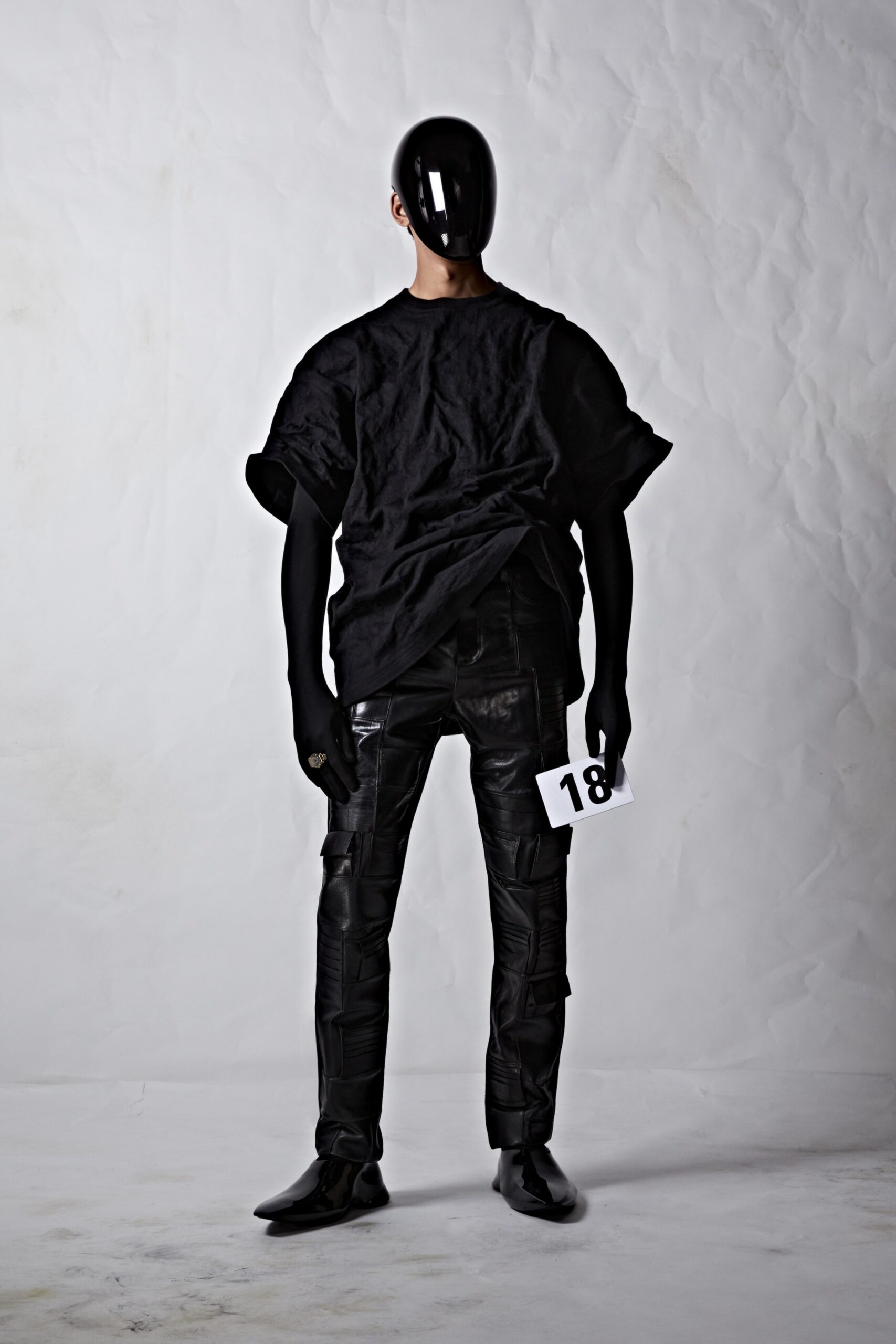 black oversized top with leather pants