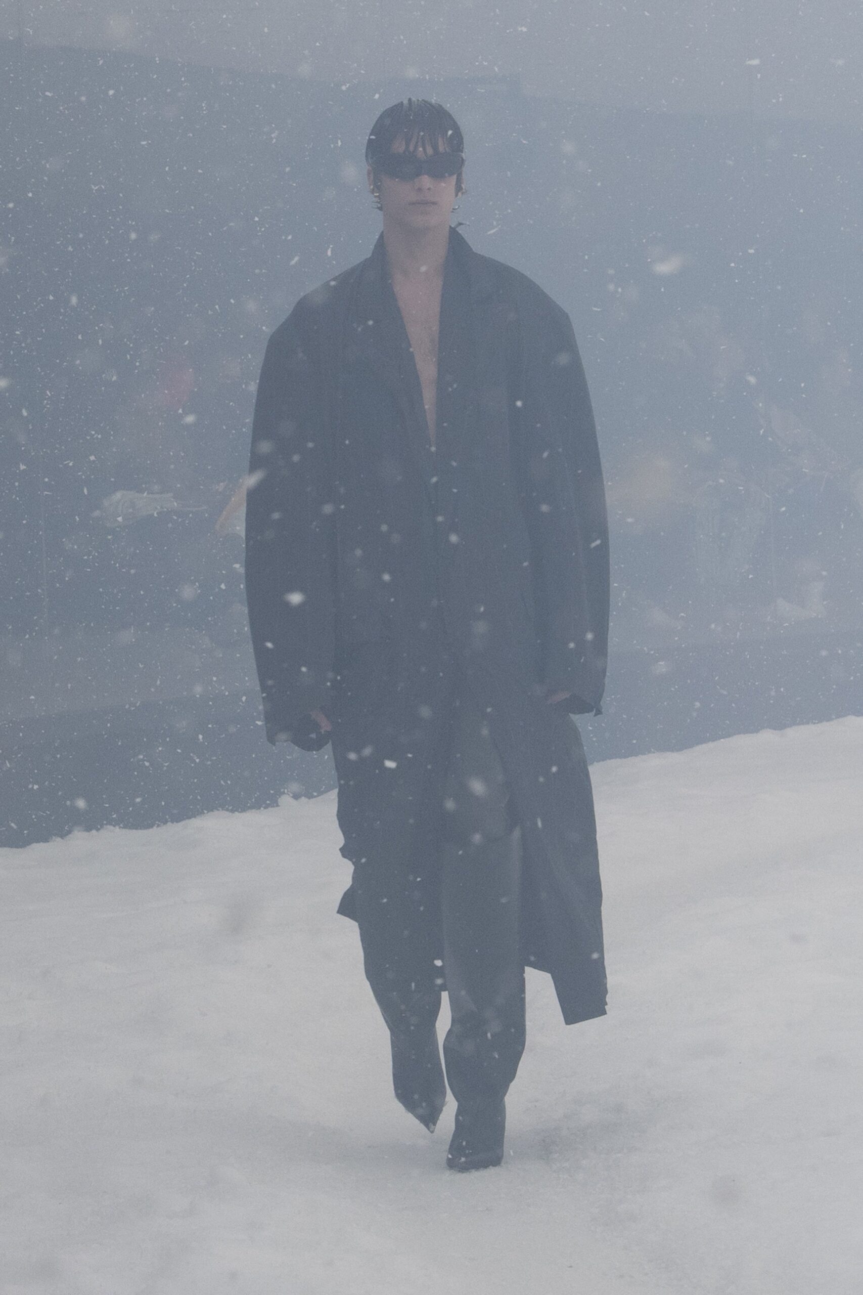 black oversized coat and relaxed pants