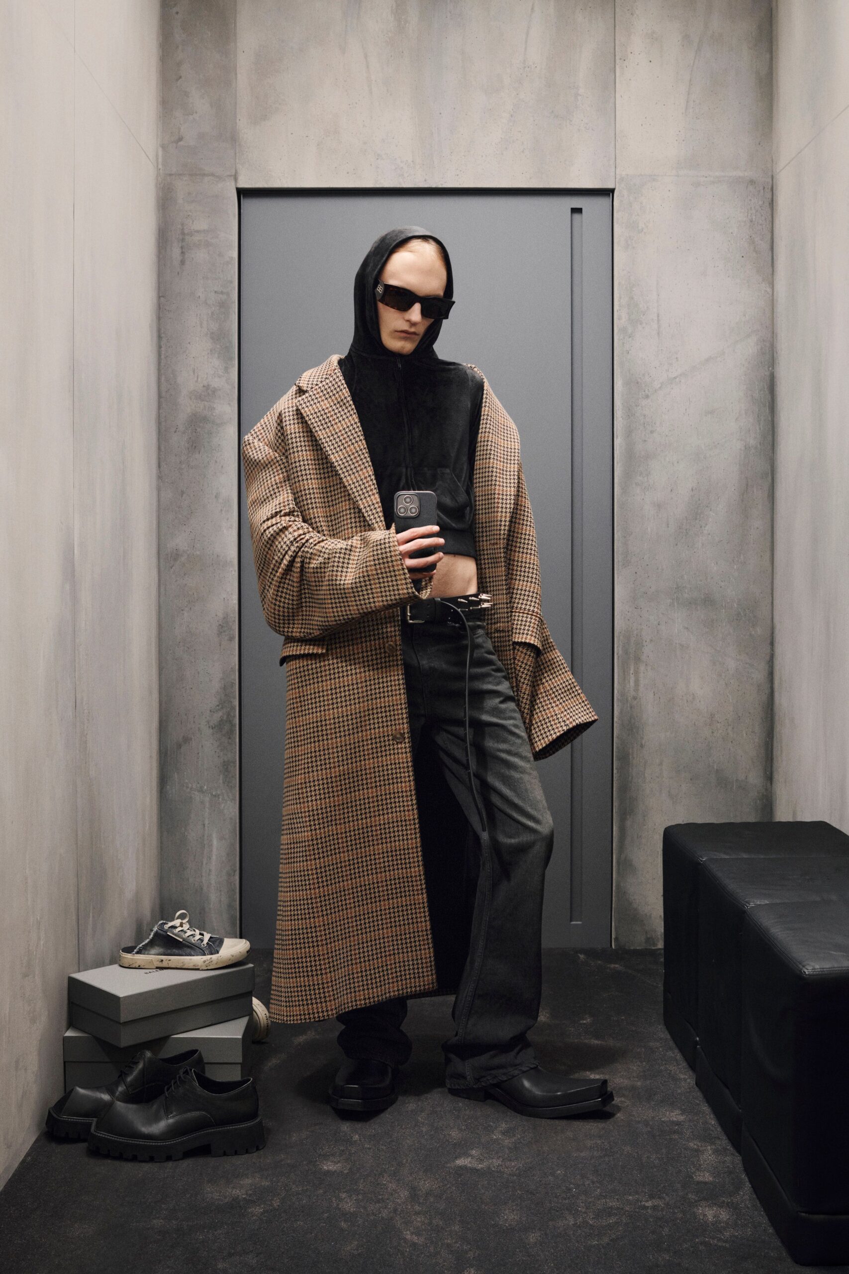 brown checked coat with black hoodie