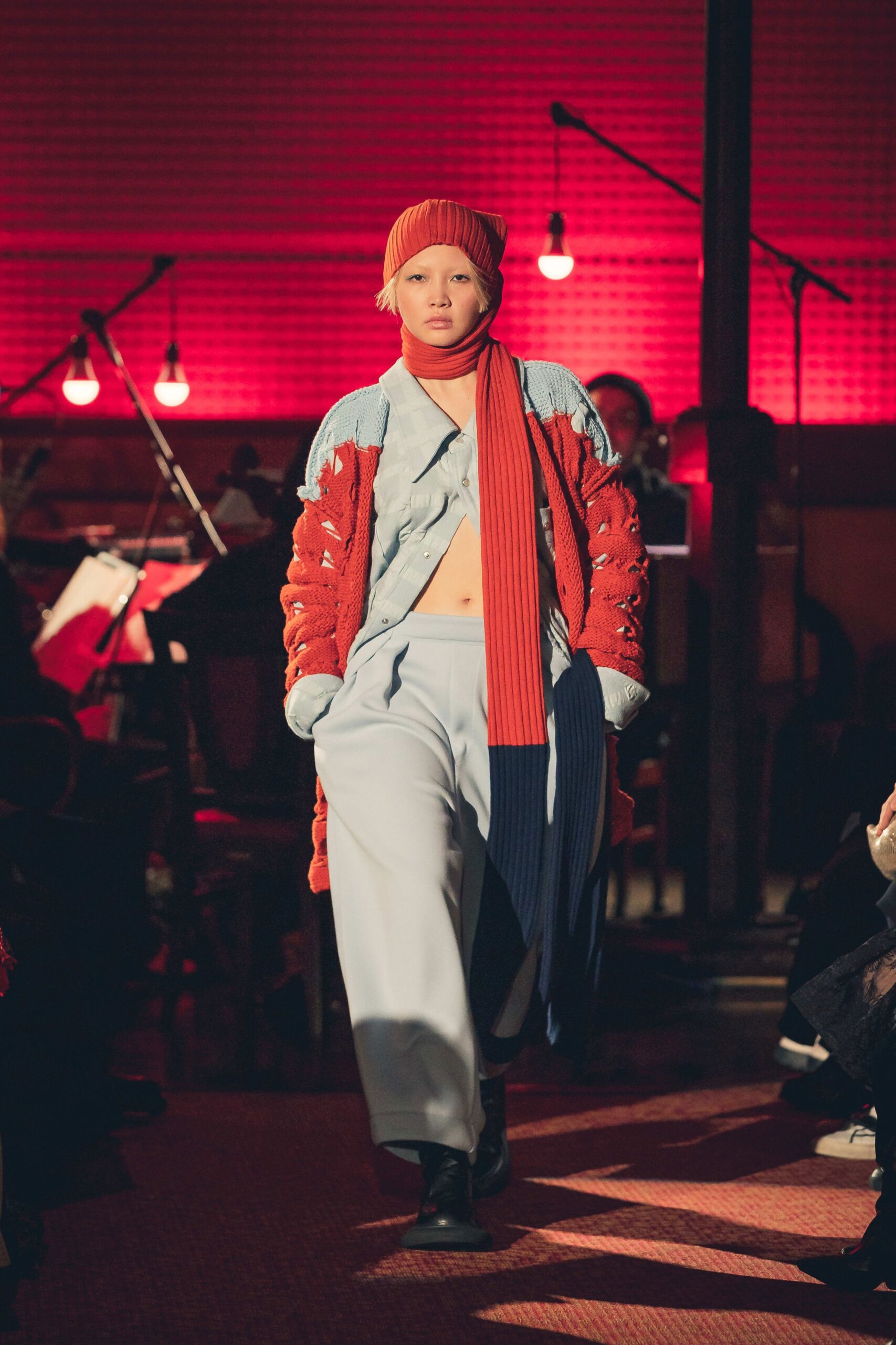 orange knit jacket with denim shirt