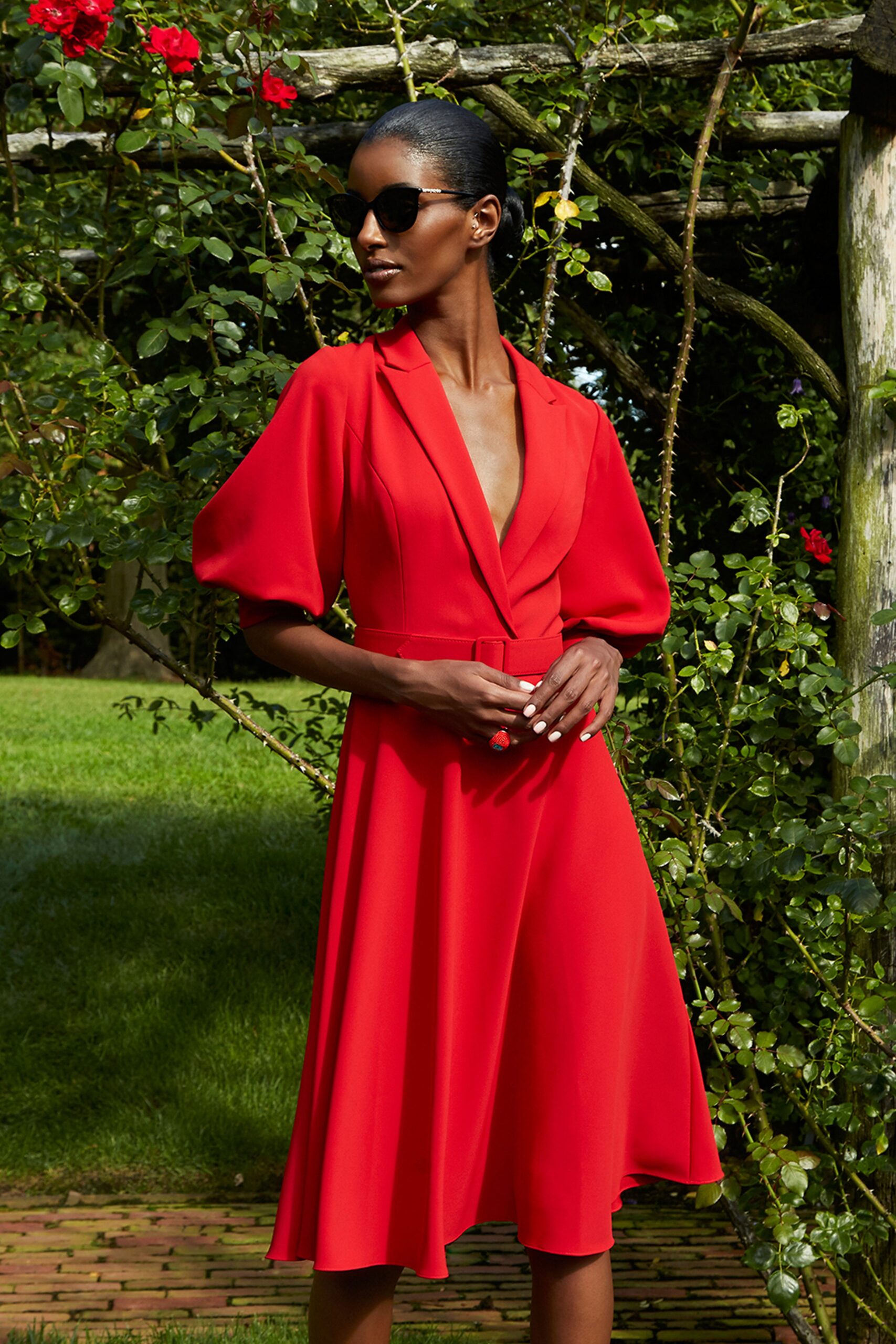 red silk short-sleeve v-neck fitted belted a-line dress