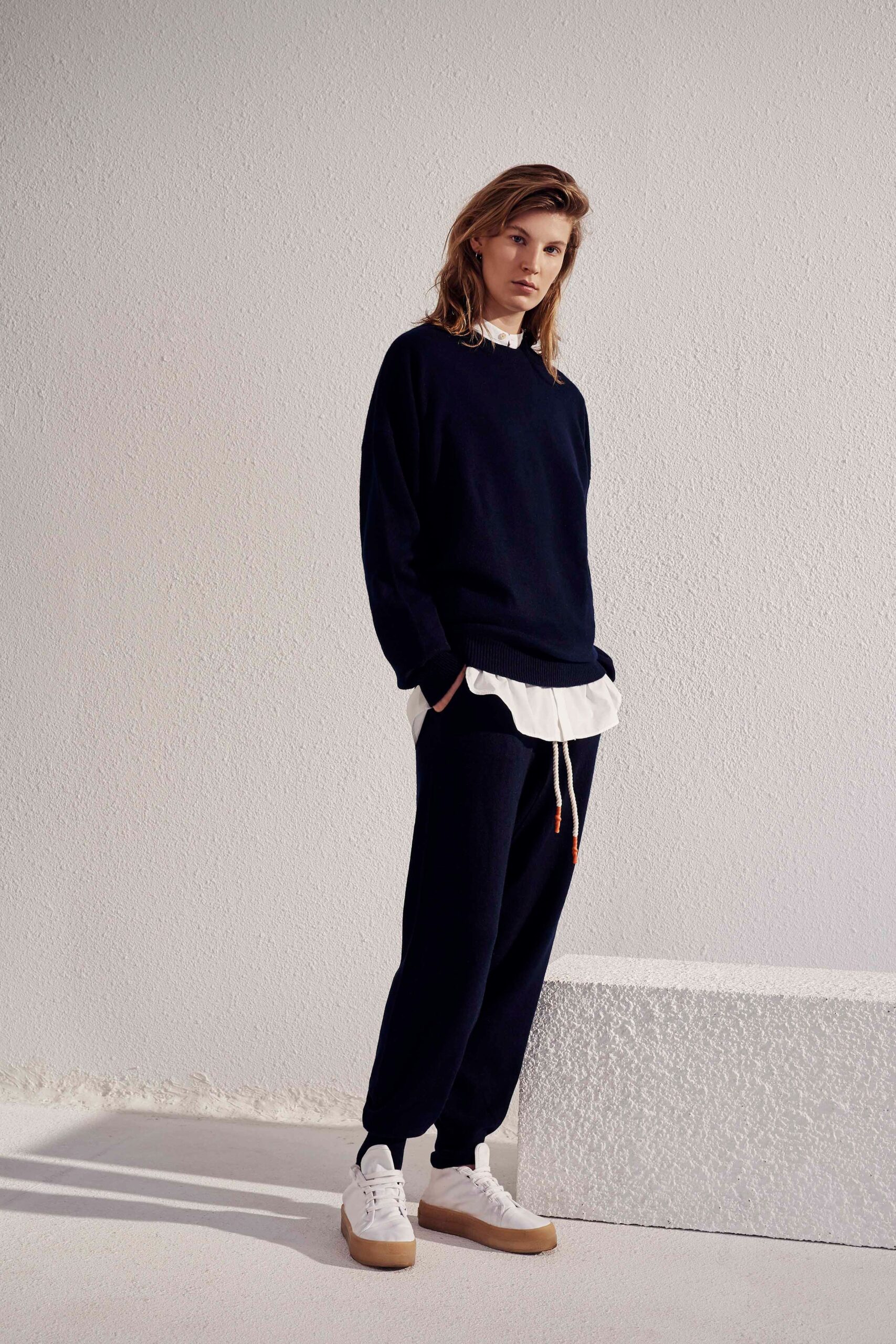 navy relaxed sweater with white shirt