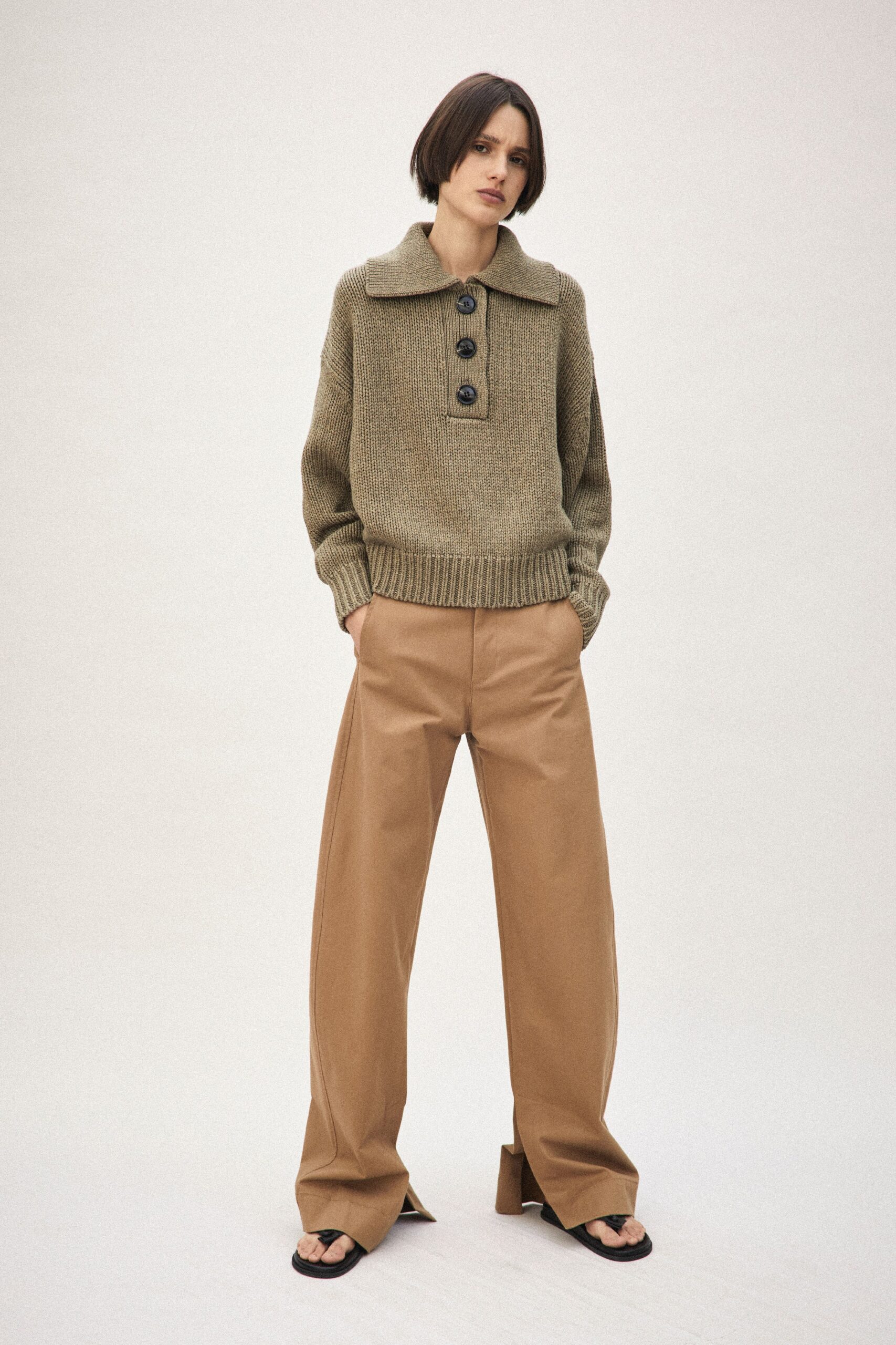 green wool relaxed sweater and brown pants