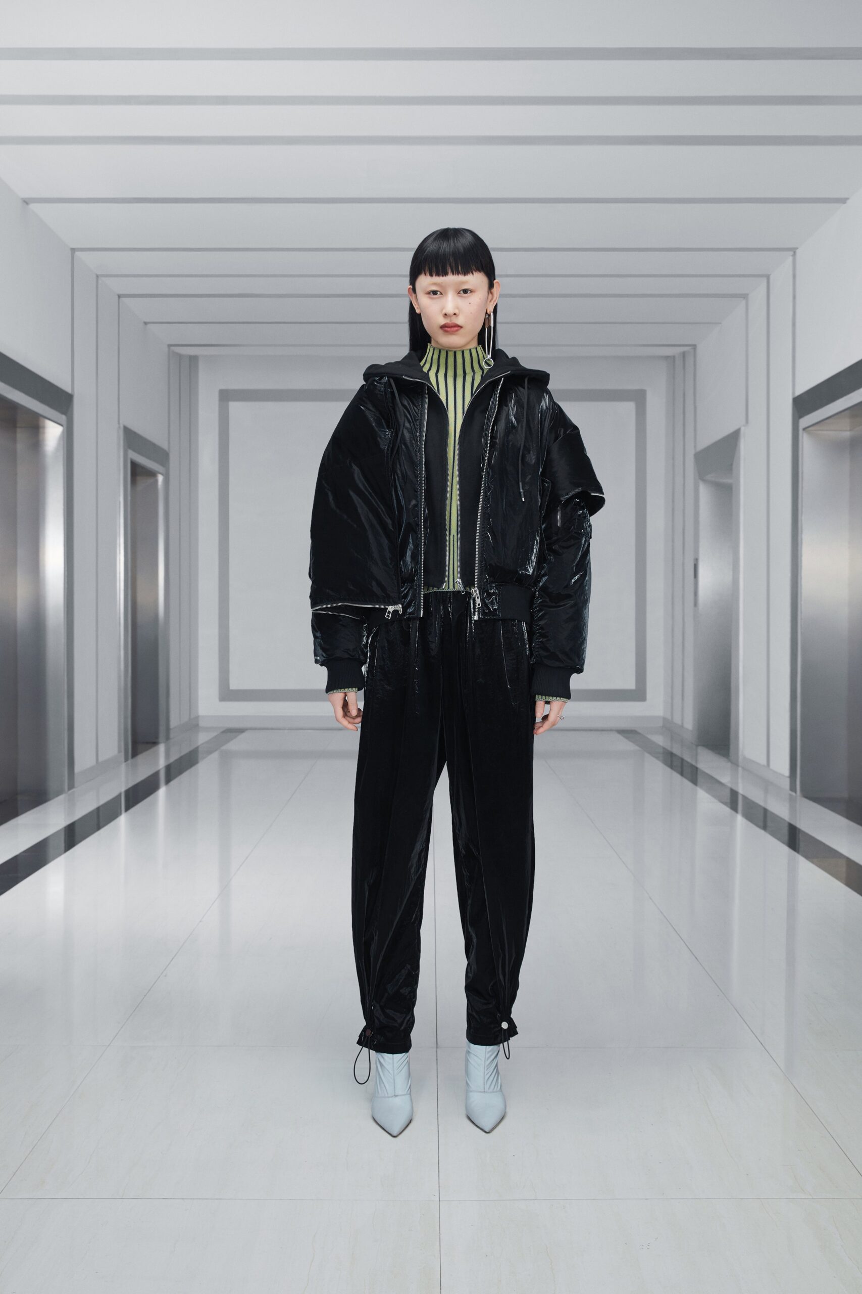 black velvet oversized jacket with green fitted top