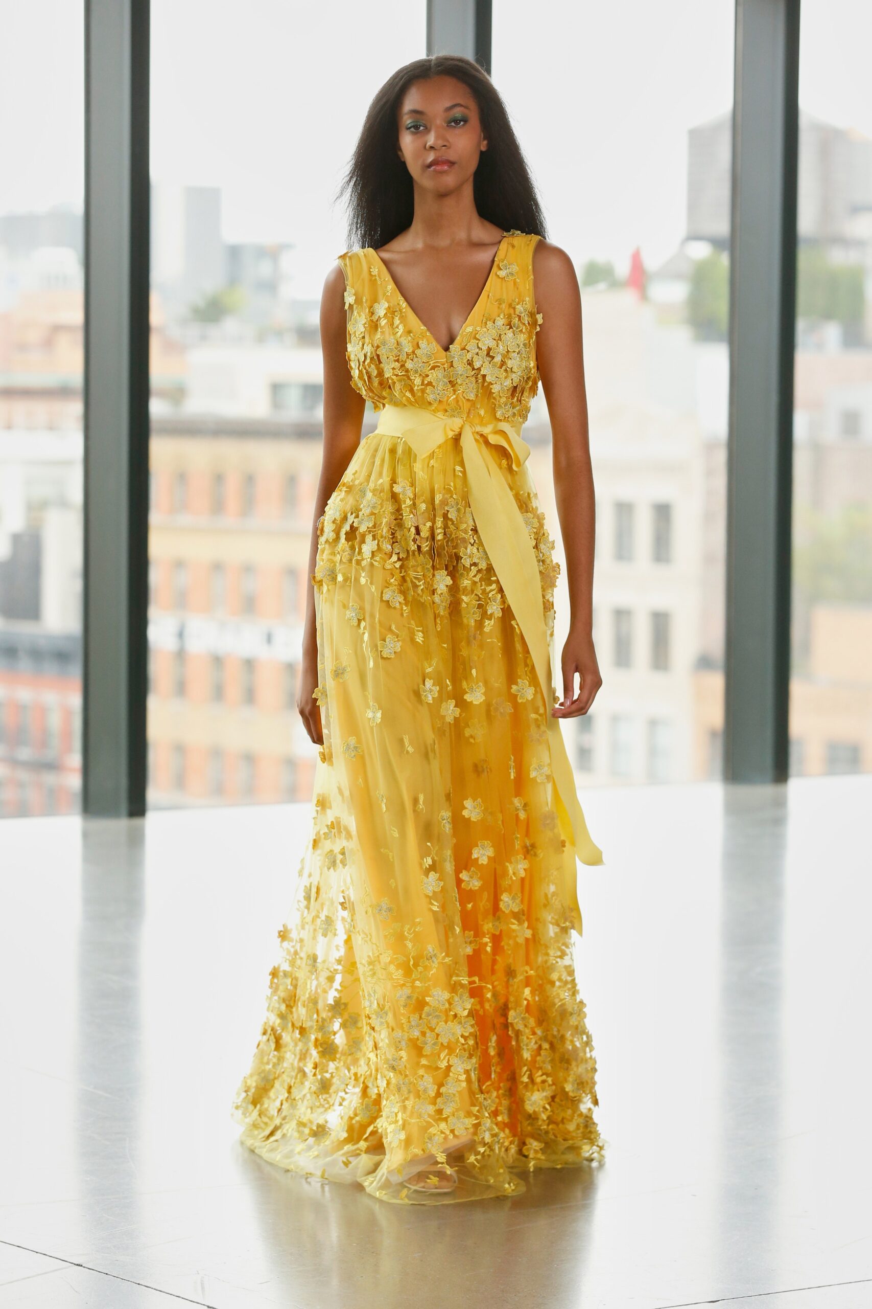 yellow embellished sleeveless gown