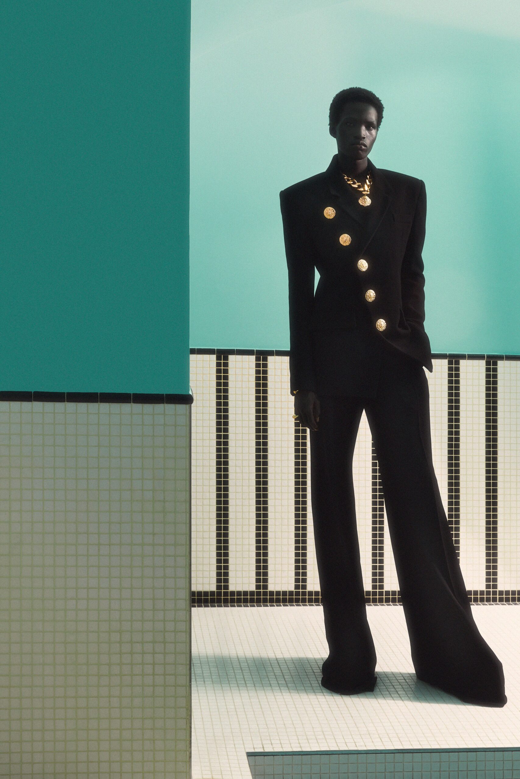 black wool long-sleeve collared tailored structured buttoned suit