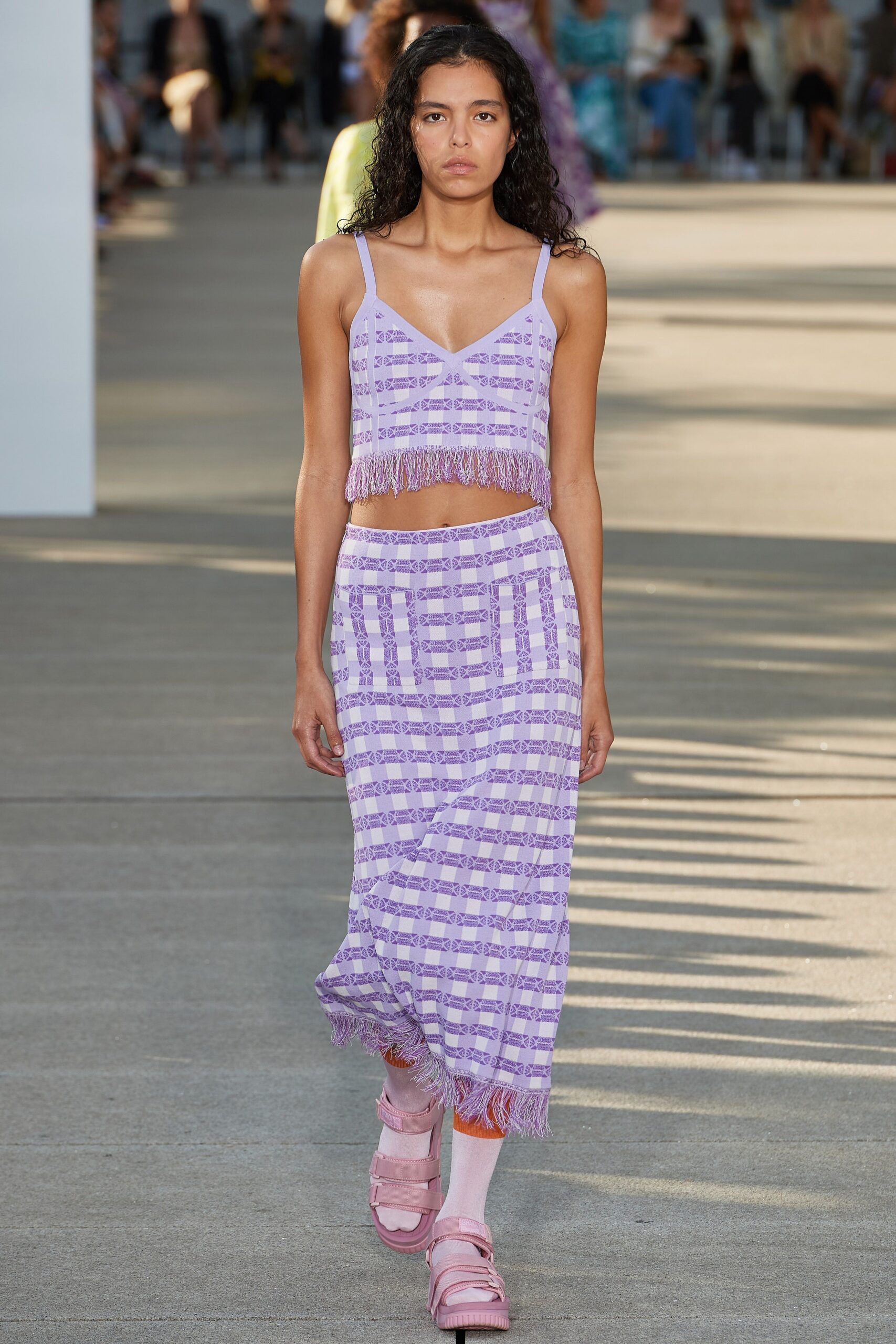 purple fringed top and skirt