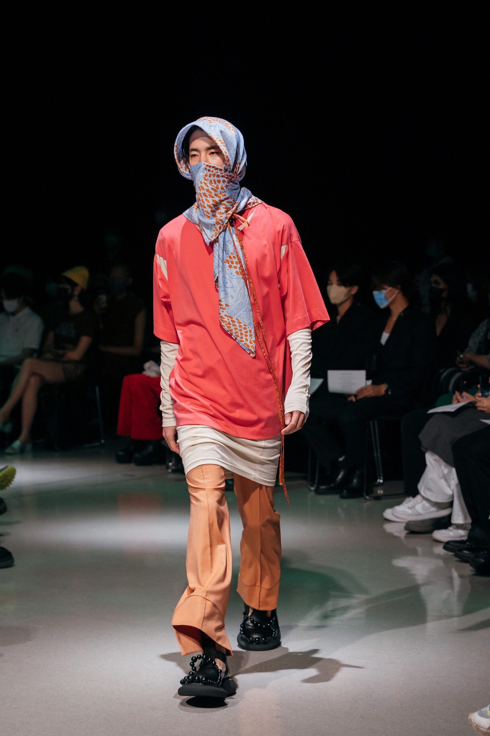 orange relaxed t-shirt with beige pants