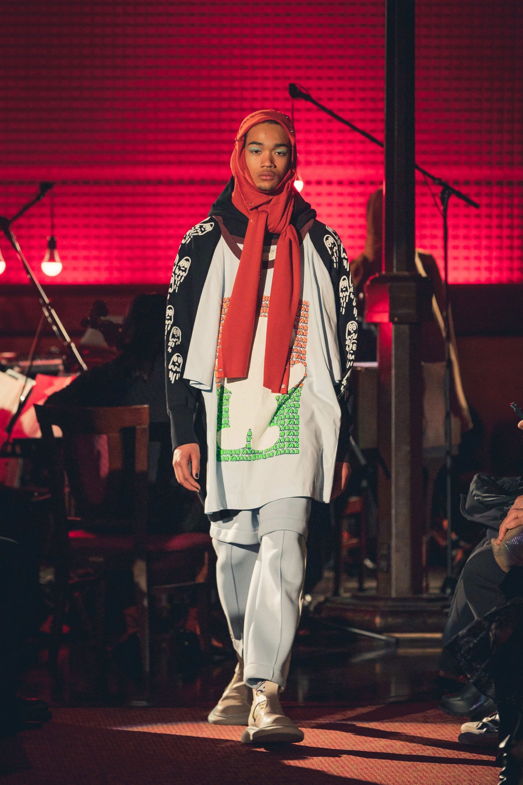 relaxed white printed top with light blue pants