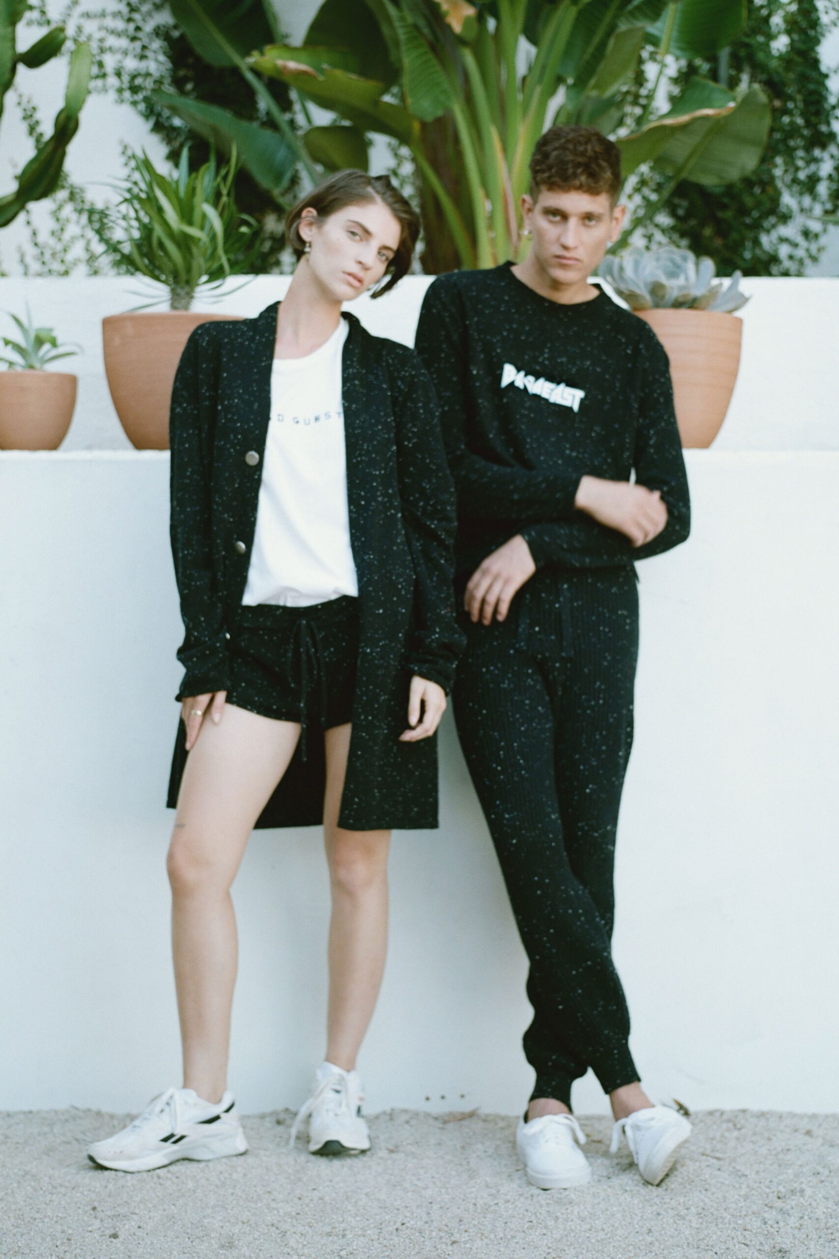 black cotton long-sleeve collared relaxed buttoned coat