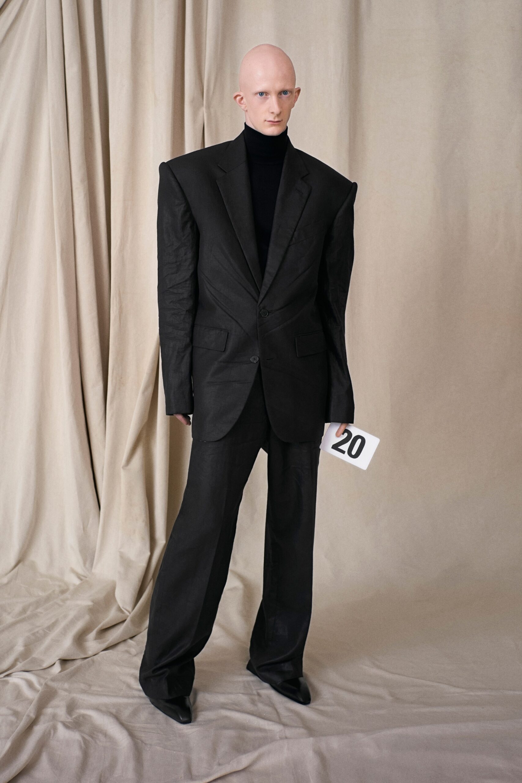 black wool long-sleeve collared tailored structured suit