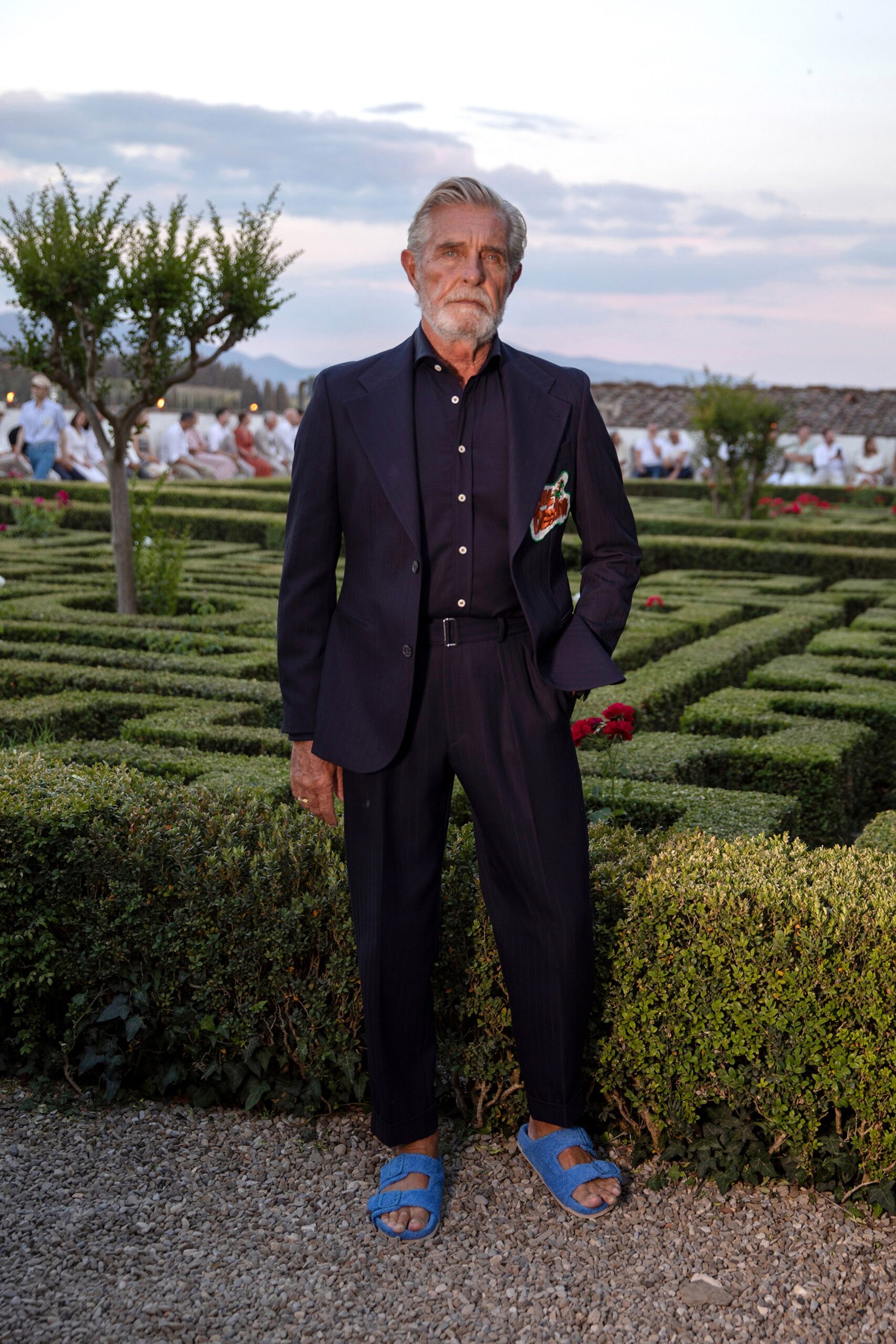 navy tailored suit with black shirt