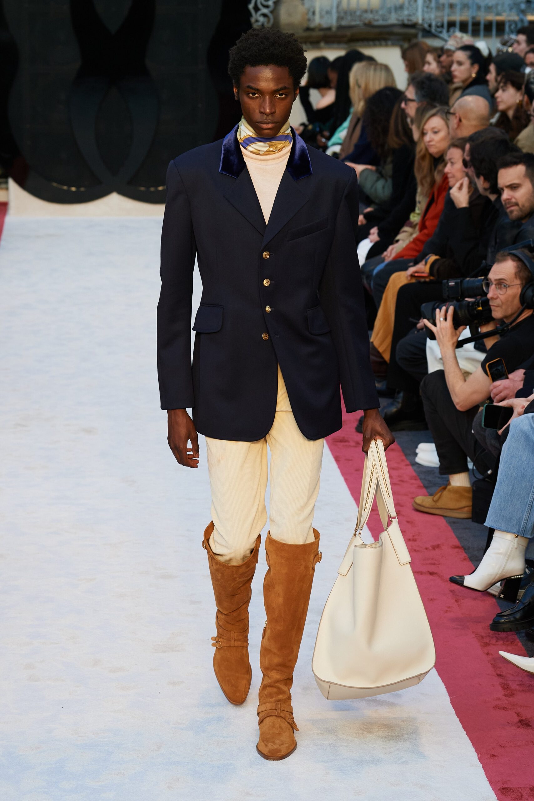 black blazer beige pants brown boots