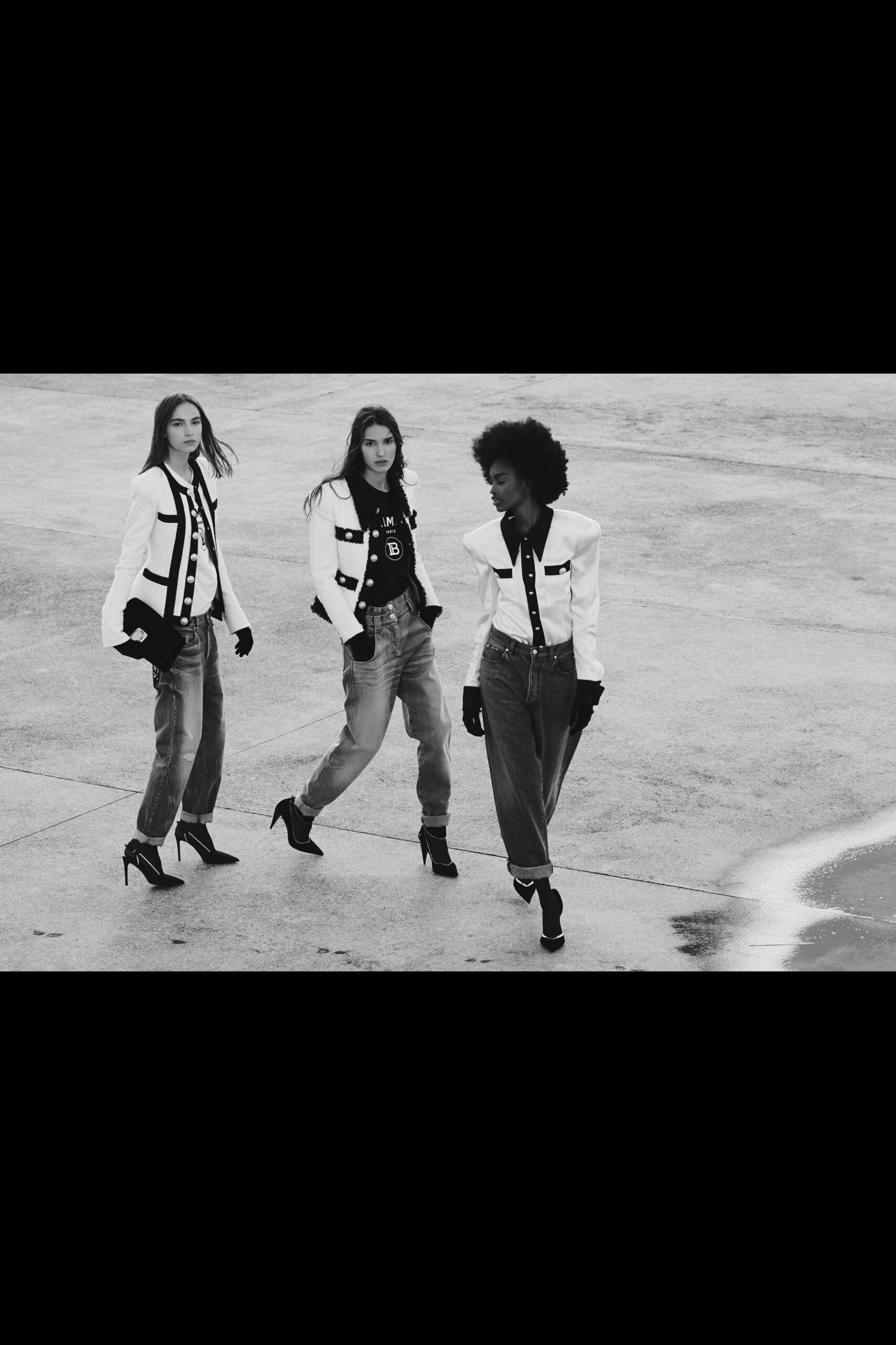 black and white tailored blazer with relaxed jeans