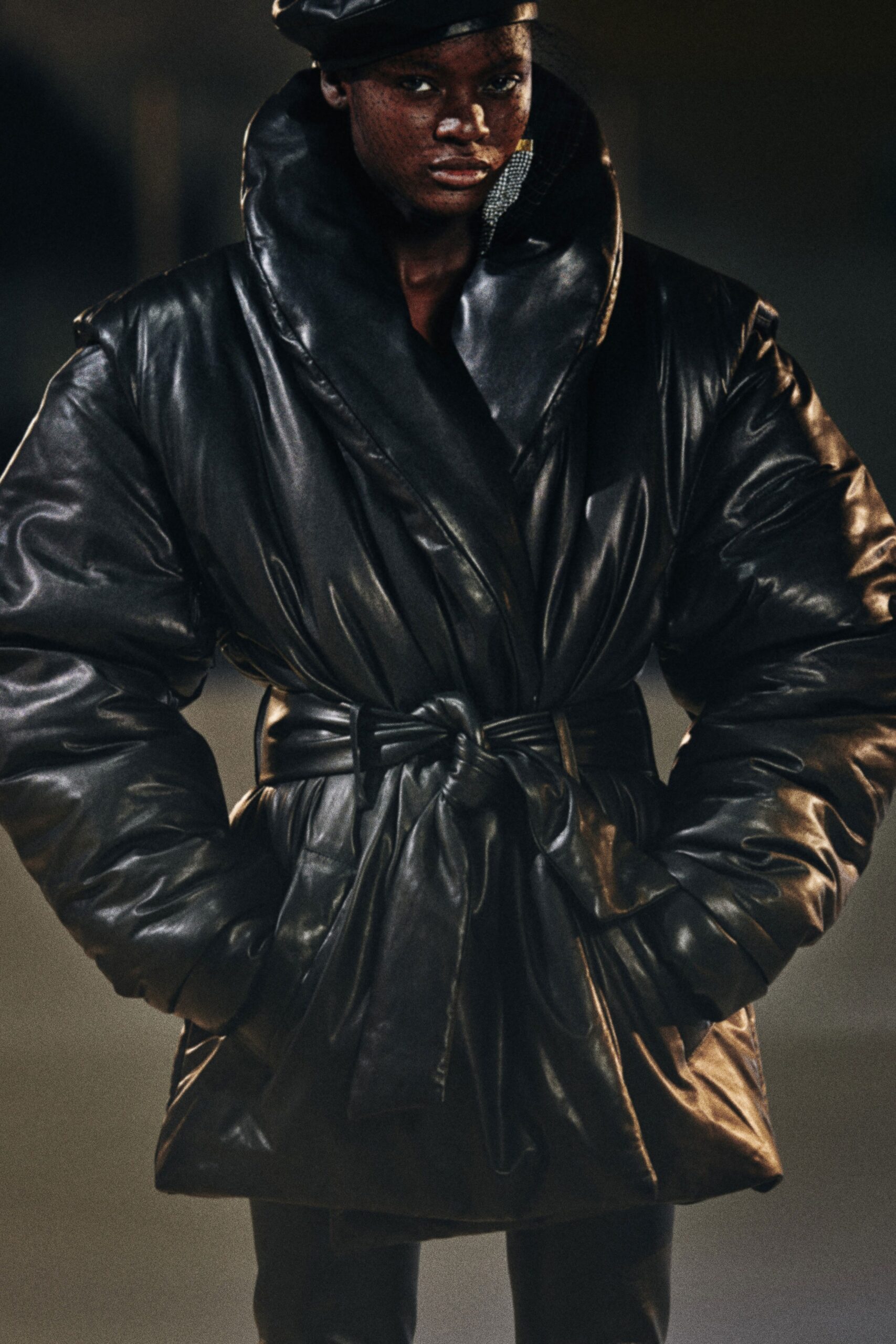 black leather belted coat