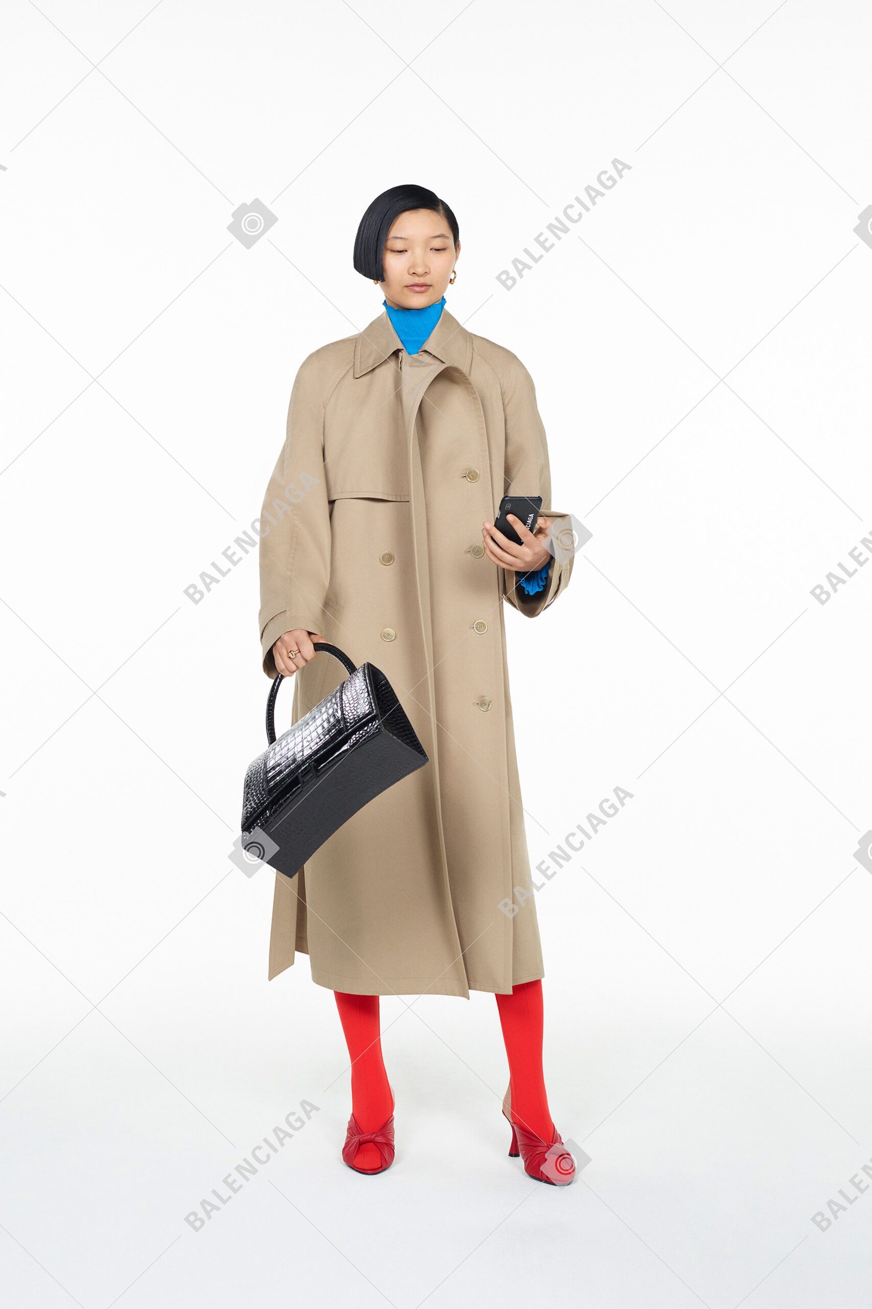 beige wool coat with blue top