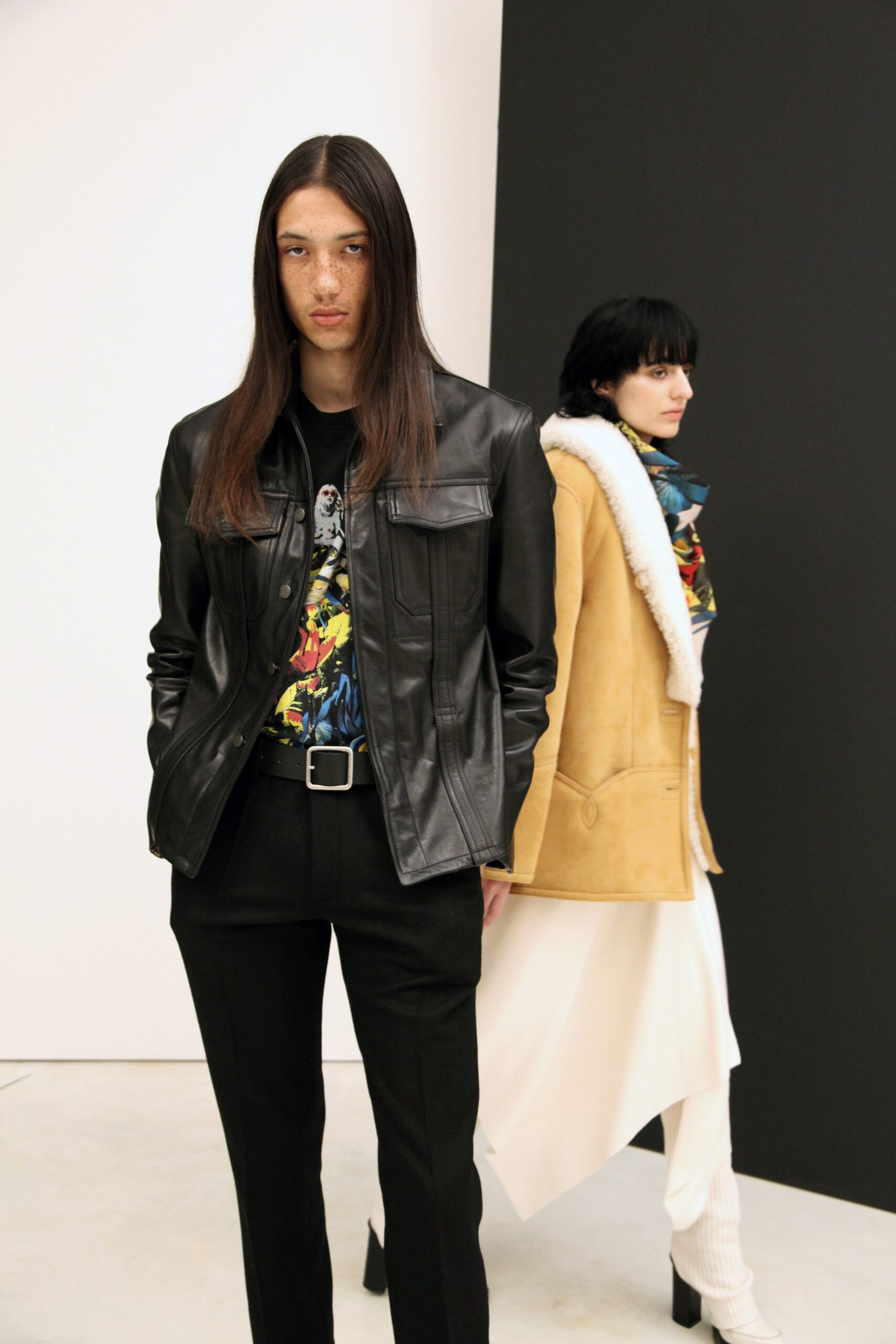 black leather fitted jacket with tailored pants