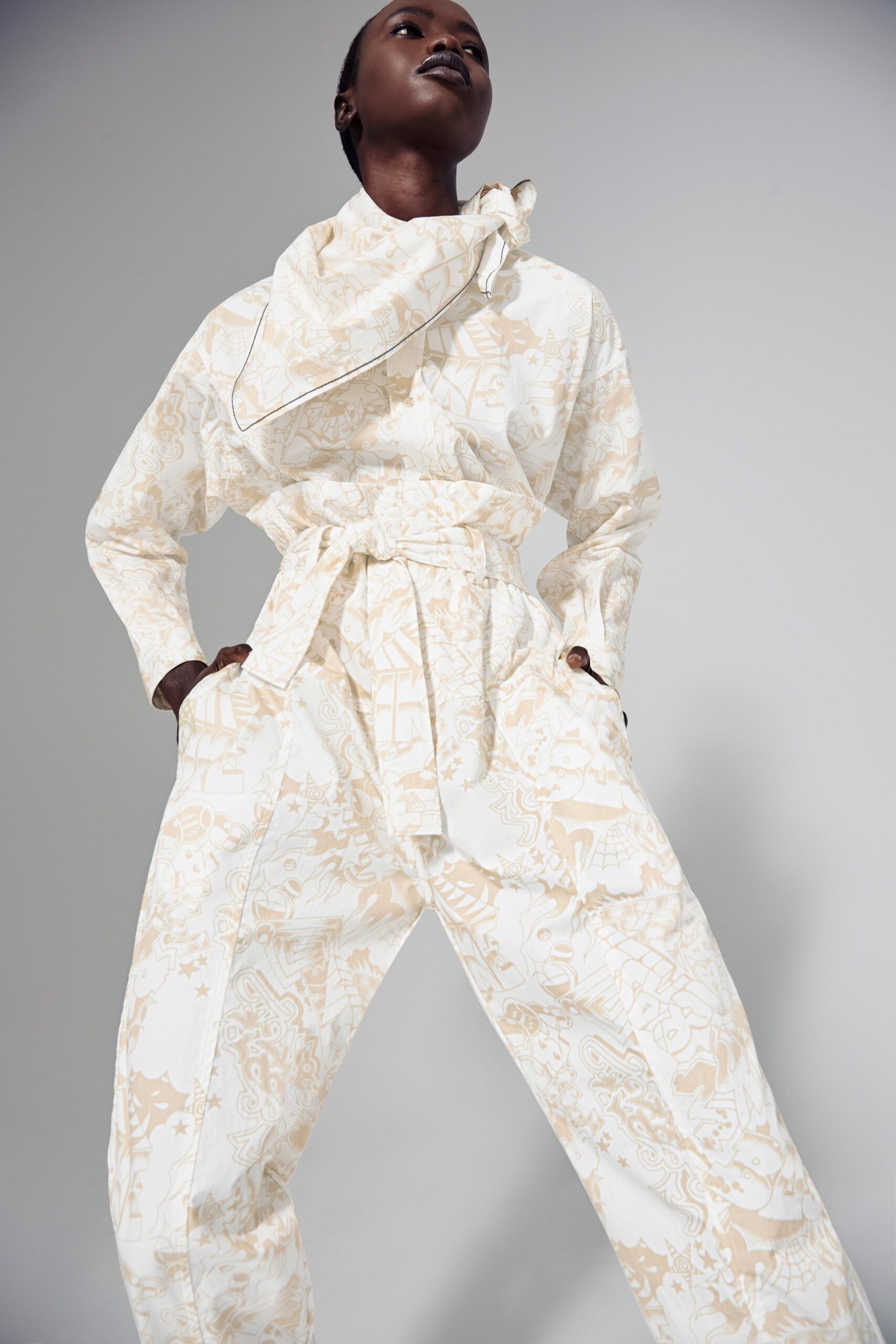 beige and white relaxed jumpsuit