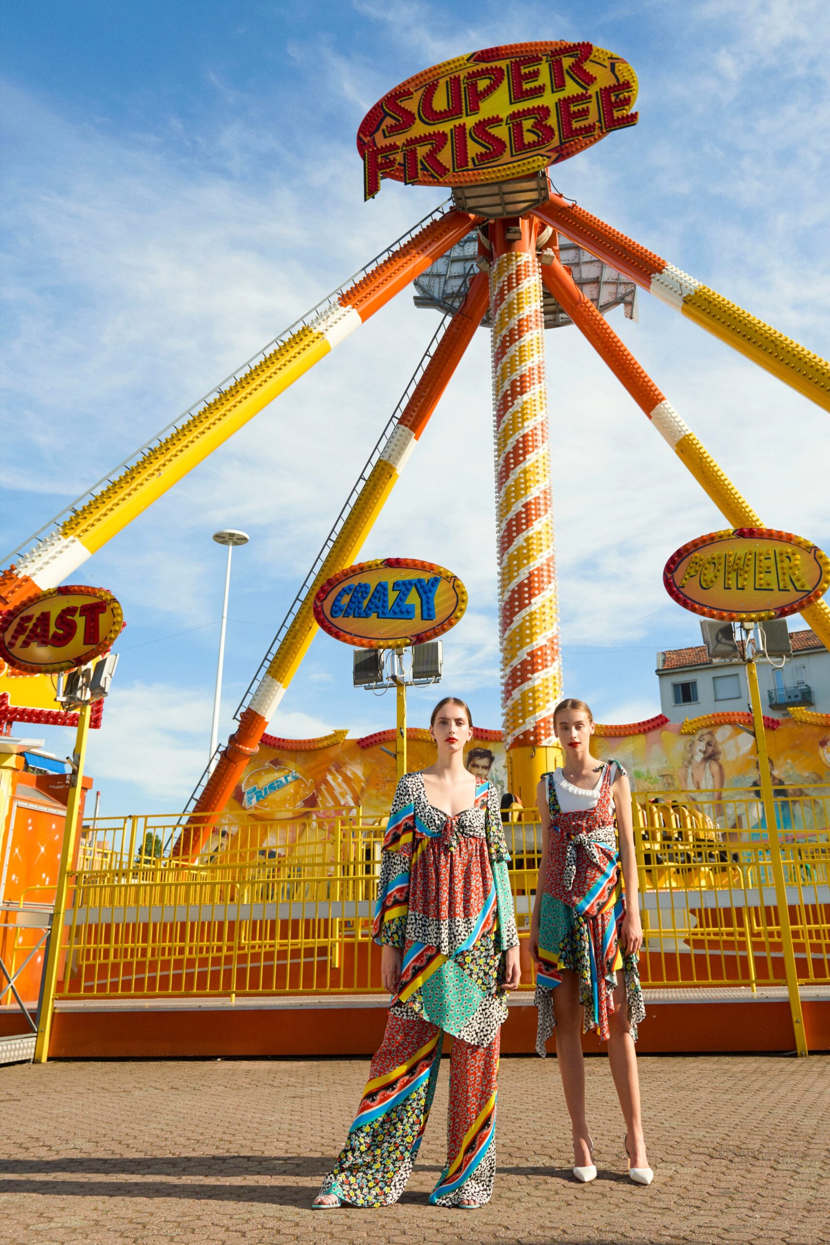 multi-colored layered dress and white lace dress