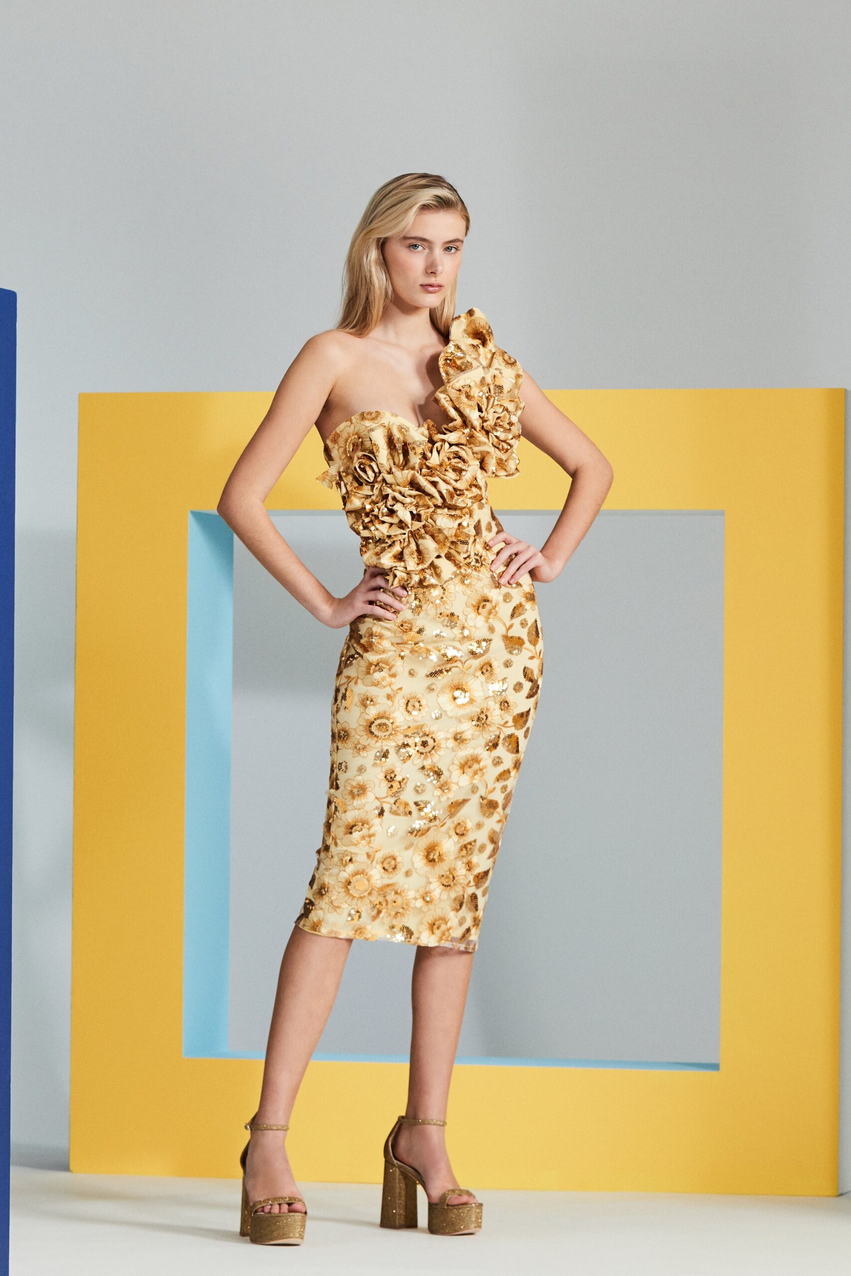 gold strapless ruffled dress