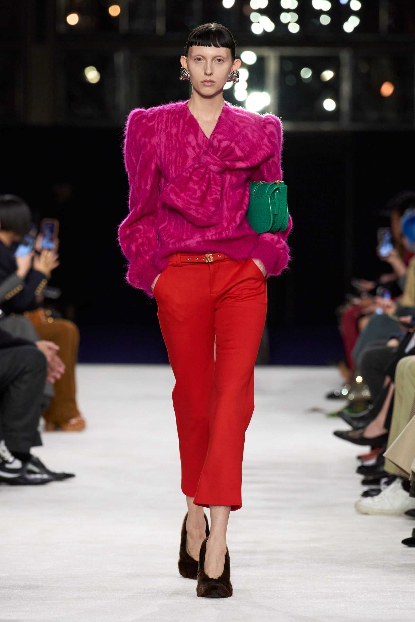 pink wool sweater red tailored pants