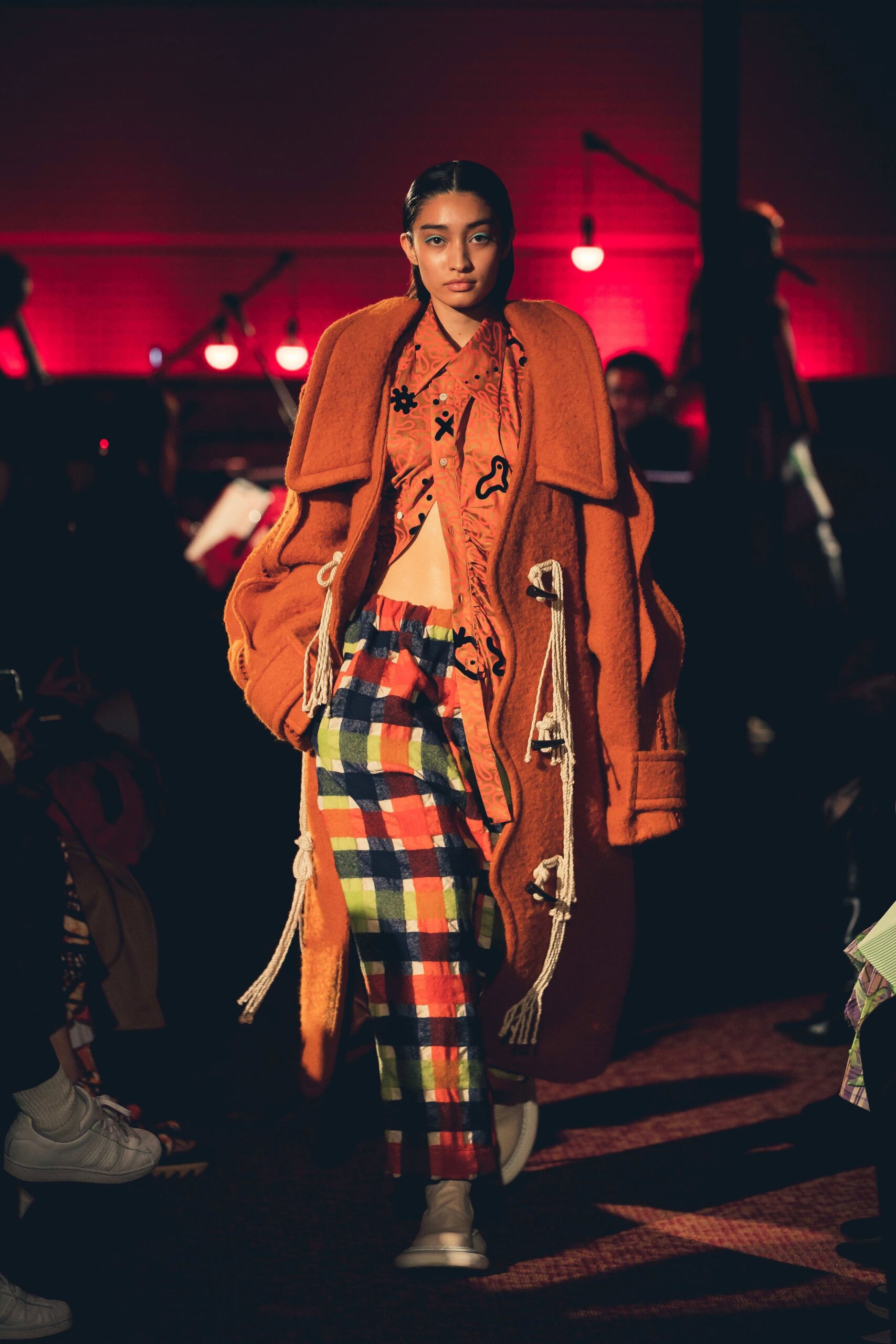 oversized orange wool coat with checked pants
