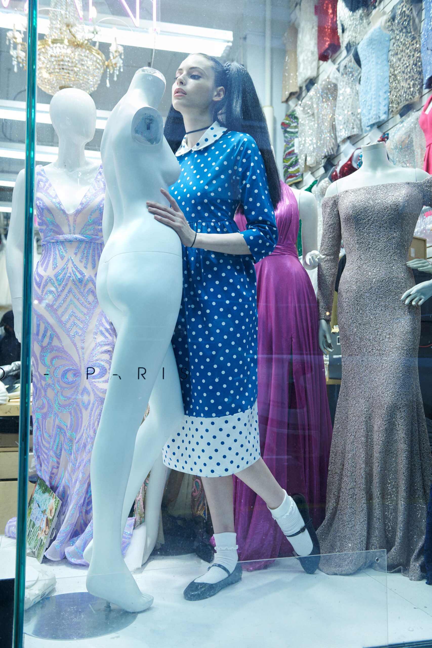 blue and white polka-dot dress
