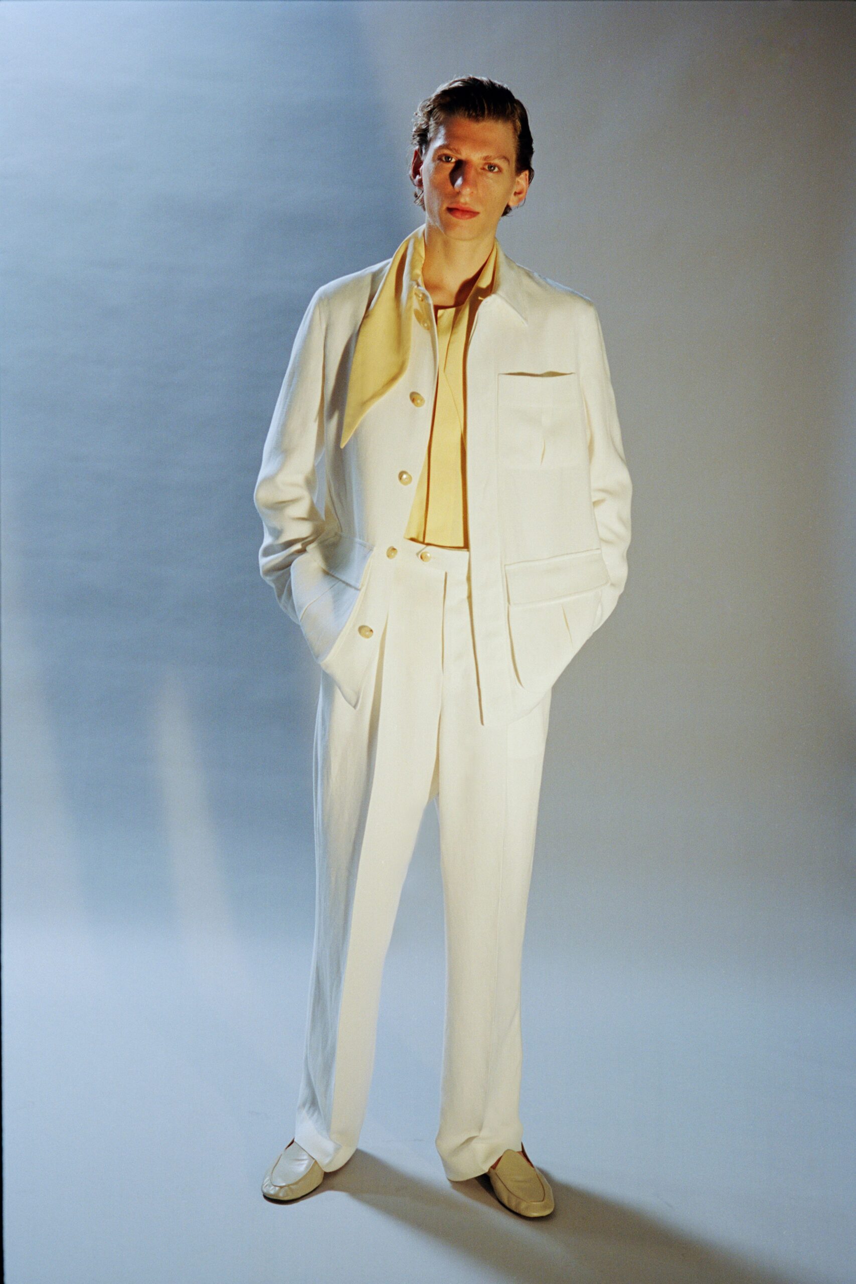 white tailored suit with yellow shirt