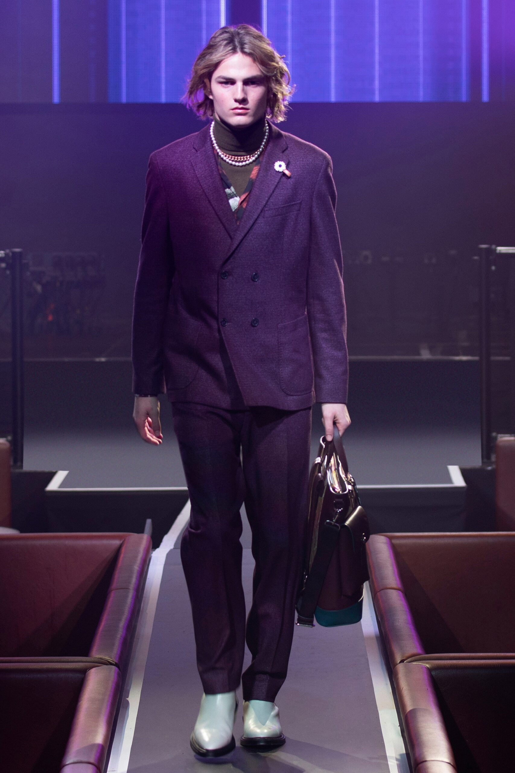 purple tailored suit with gray shoes