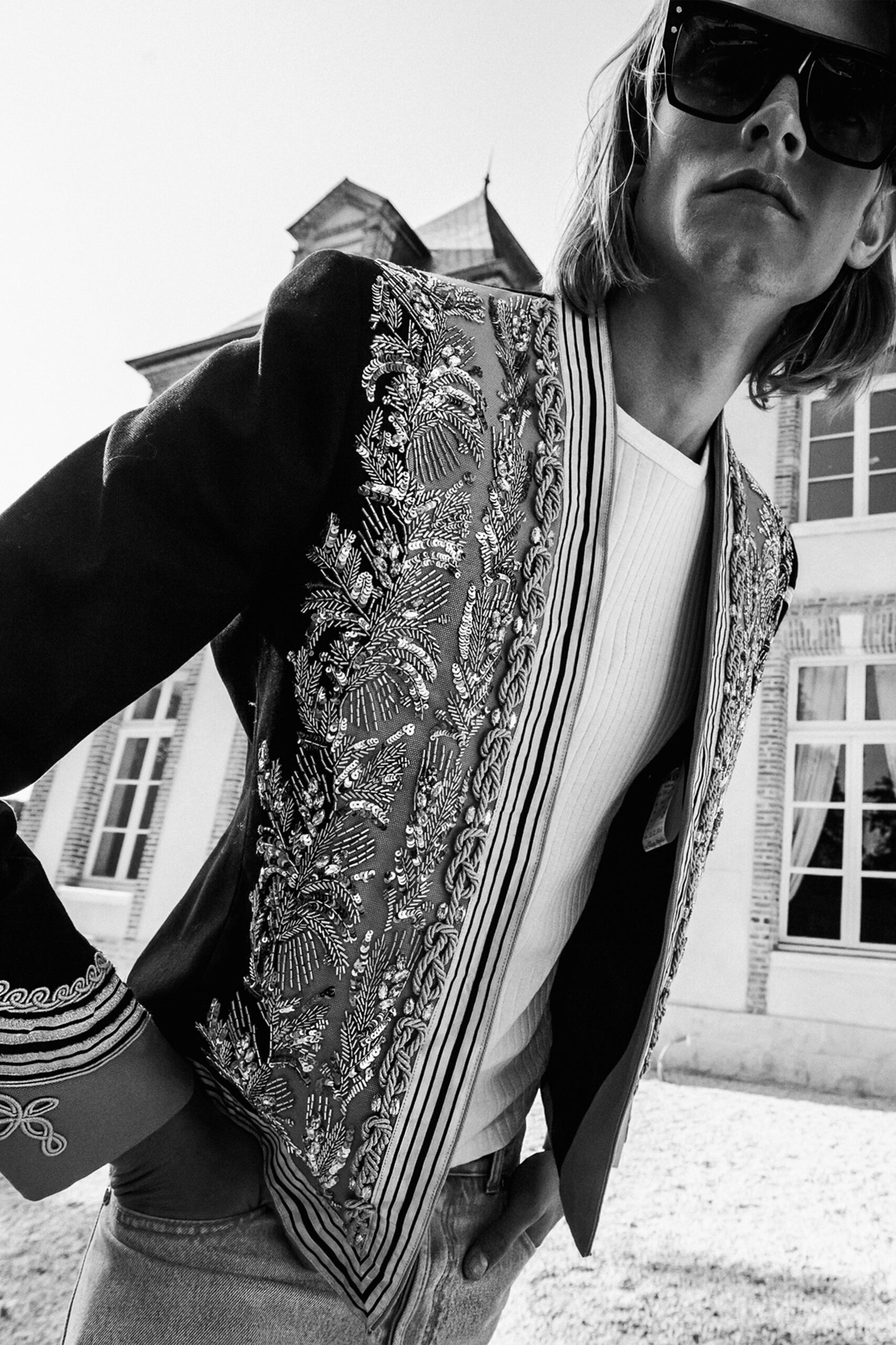 embroidered black jacket with t-shirt and jeans